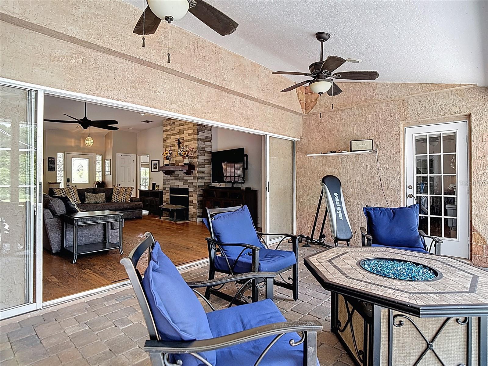 Outdoor Living and Pool Area - Quadruple Pocket Sliding Doors to Home