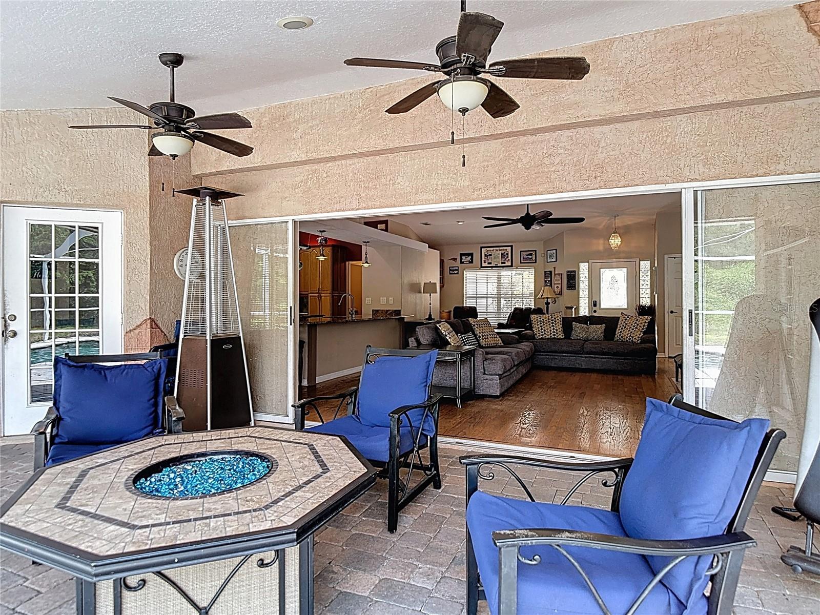 Outdoor Living and Pool Area - Quadruple Pocket Sliding Doors to Home