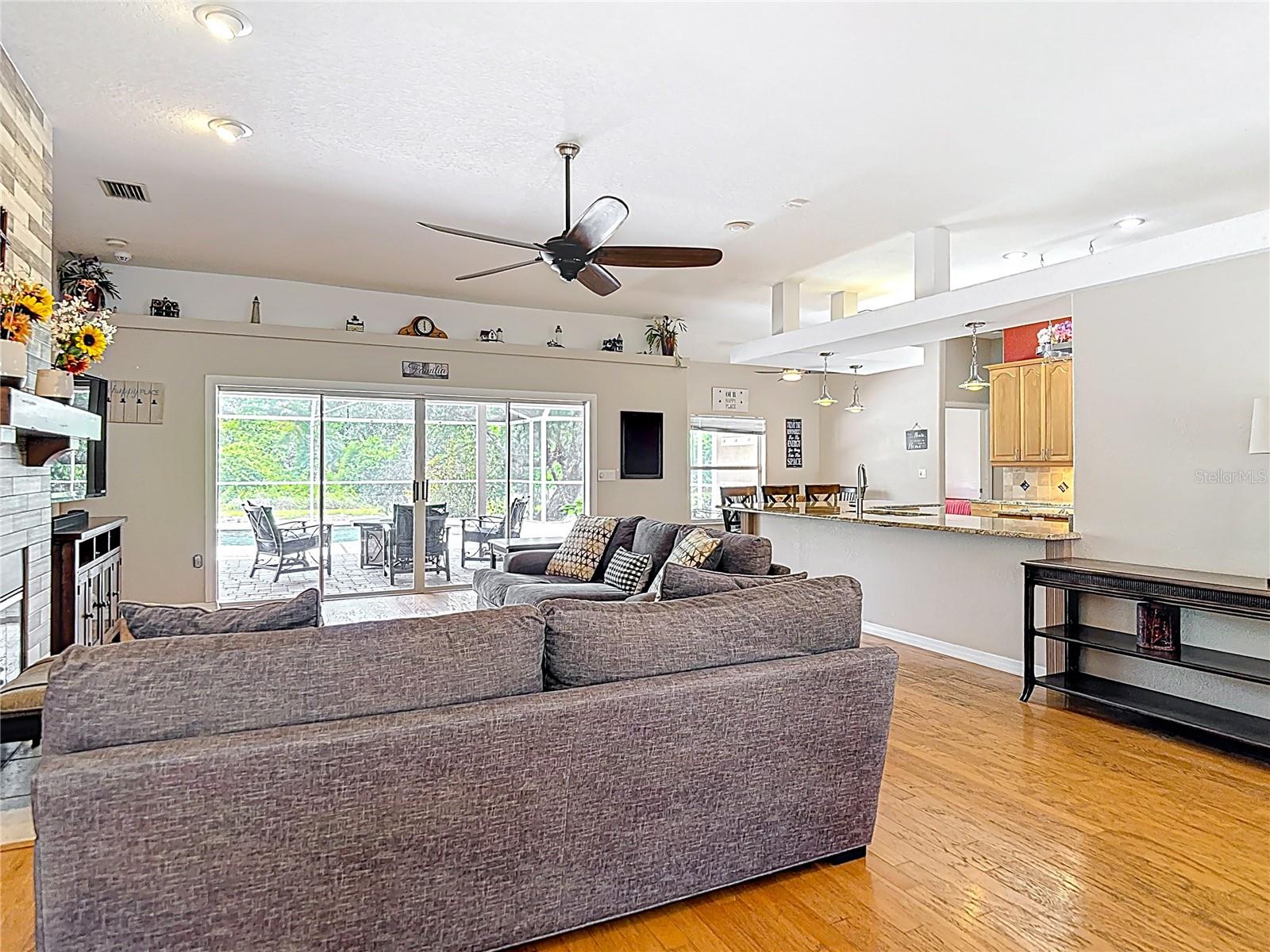 Living Room - Kitchen - Outdoor Living & Pool Area