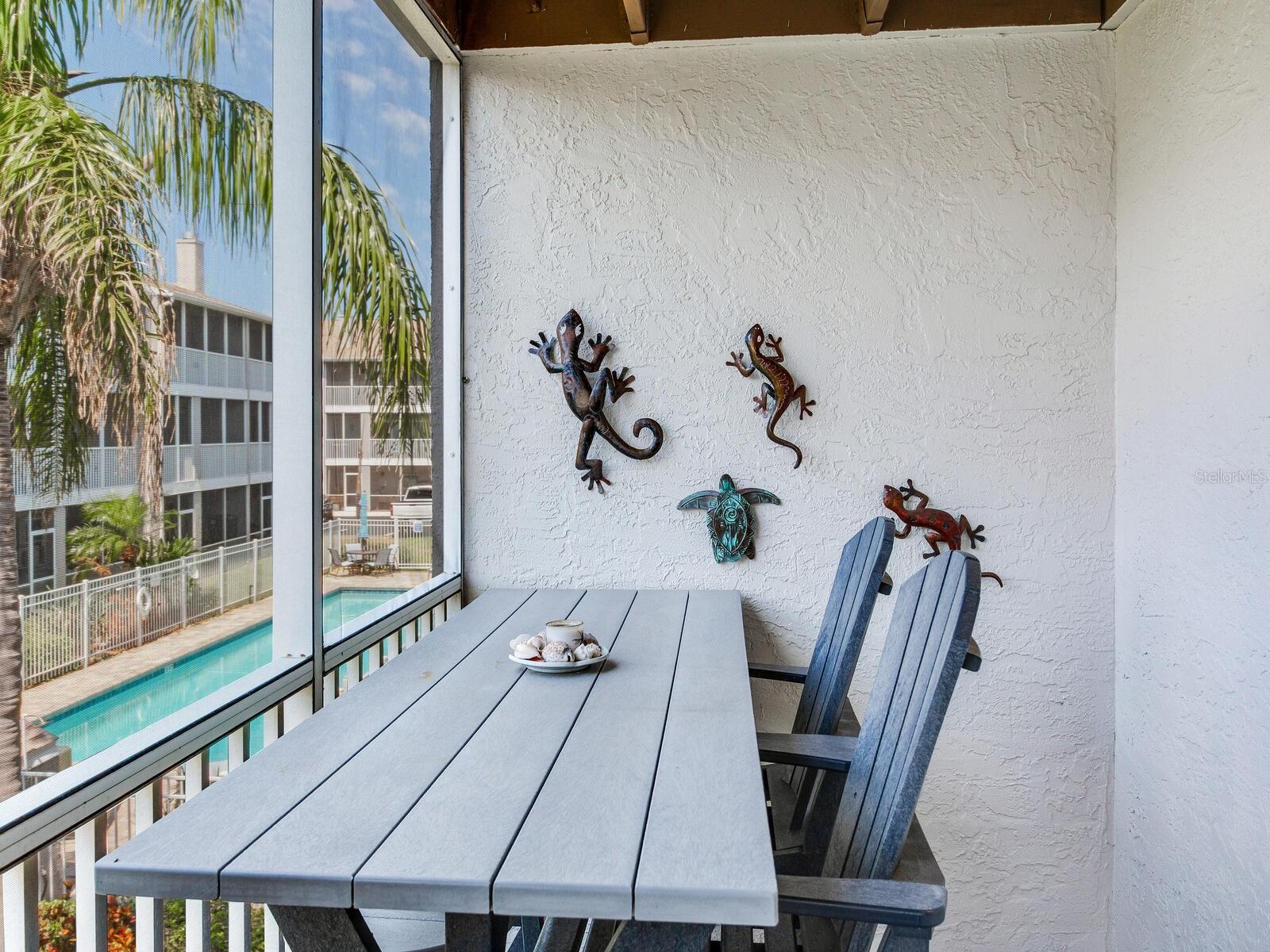 Screened in Porch over looking heated pool