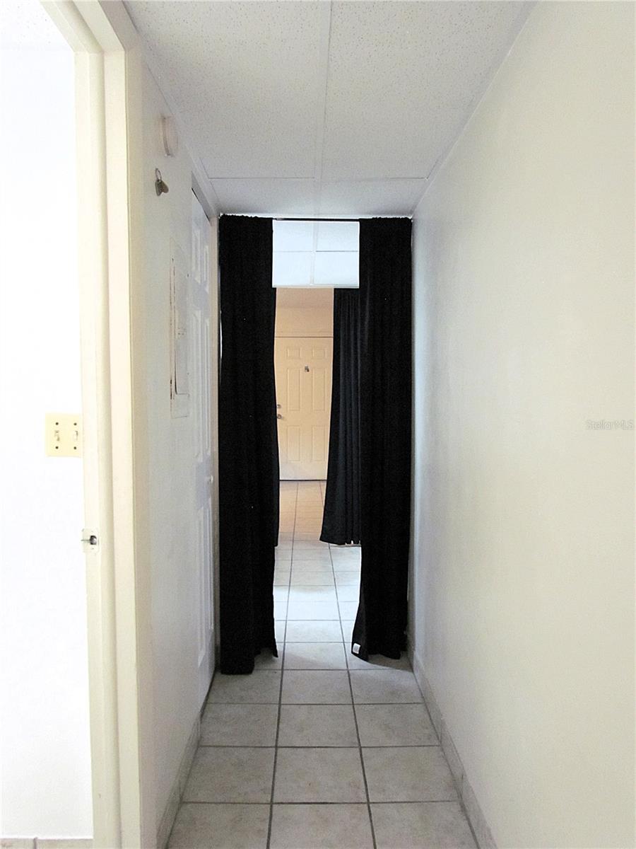 HALLWAY TO KITCHEN & LIVING ROOM