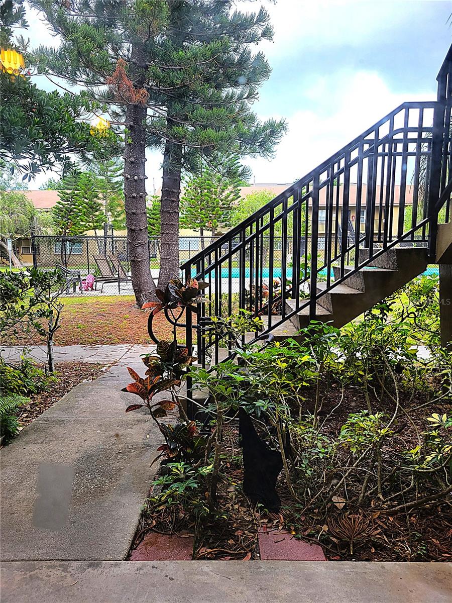 POOL/COURTYARD VIEW FROM LIVING ROOM