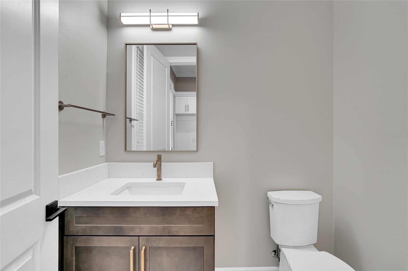 HALF BATH BY MUD ROOM