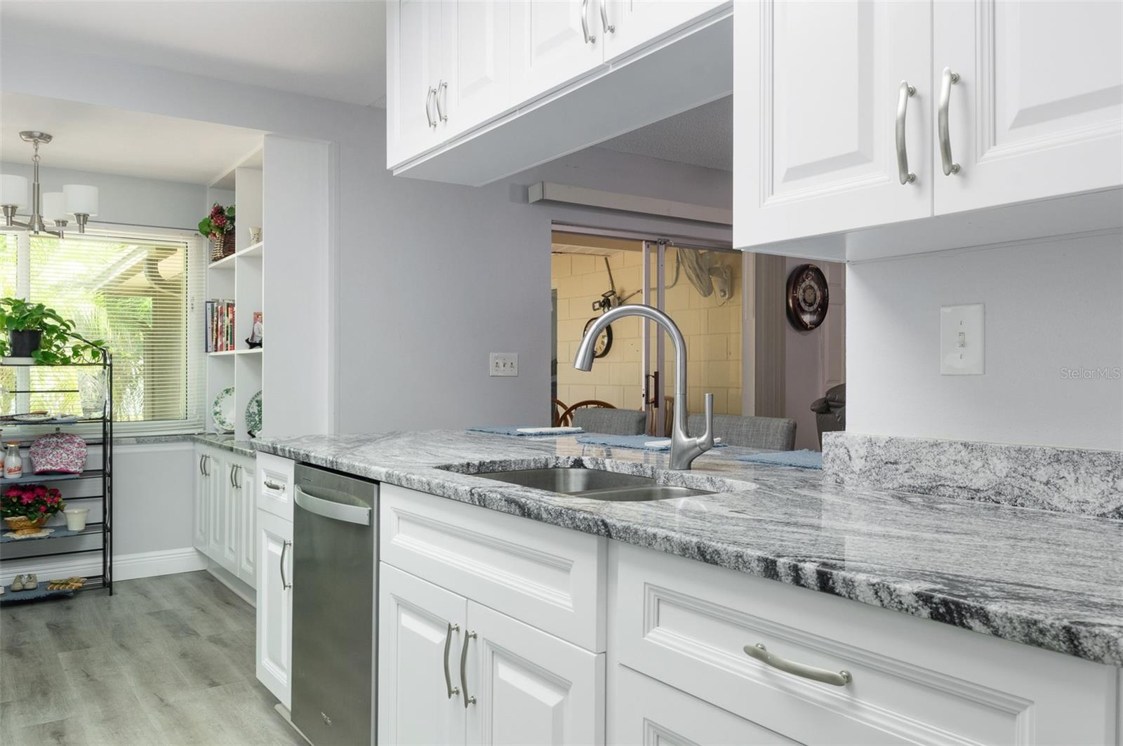 Kitchen with view into breakfast nook built-ins
