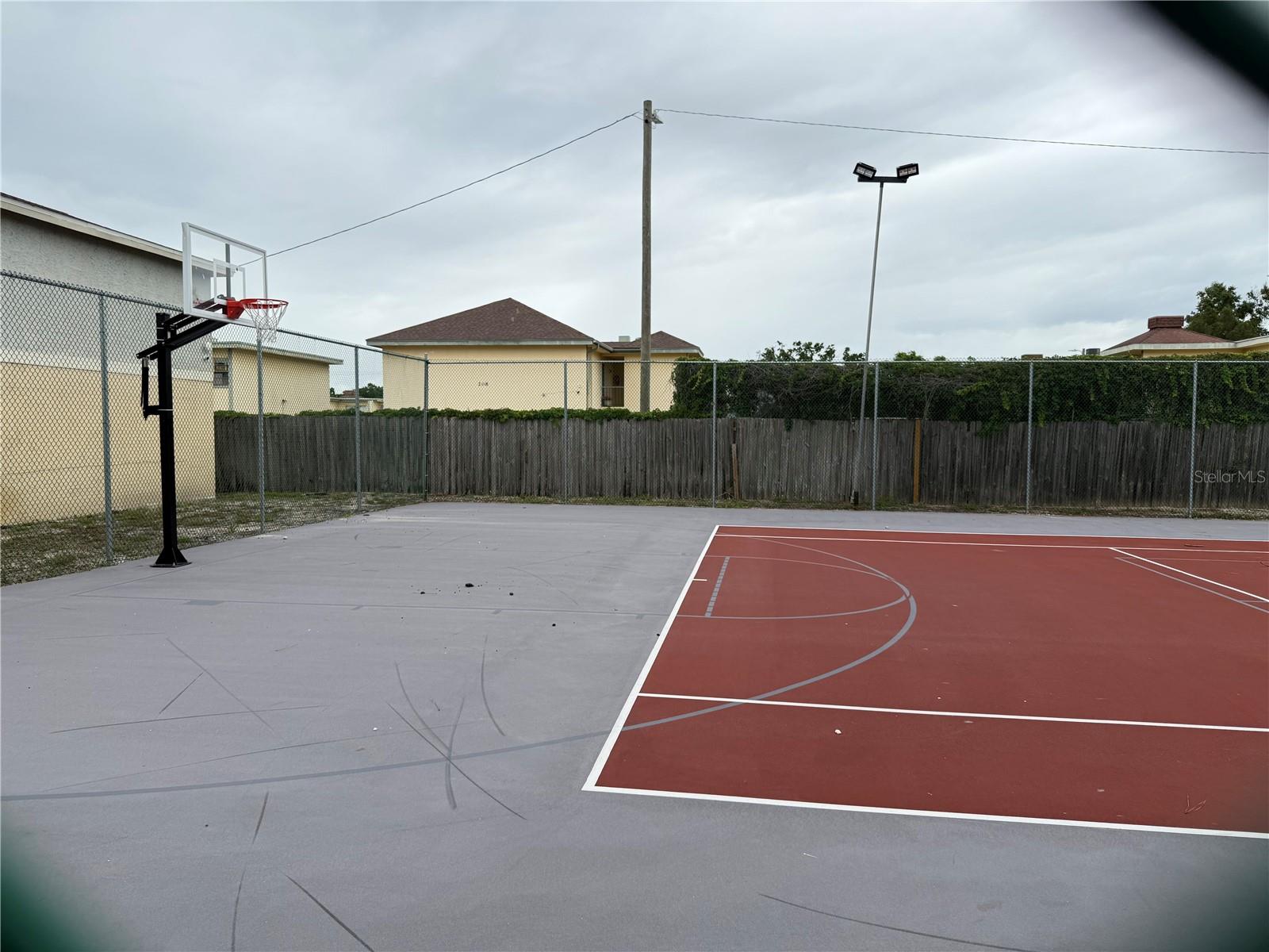 TENNIS/BASKETBALL COURT