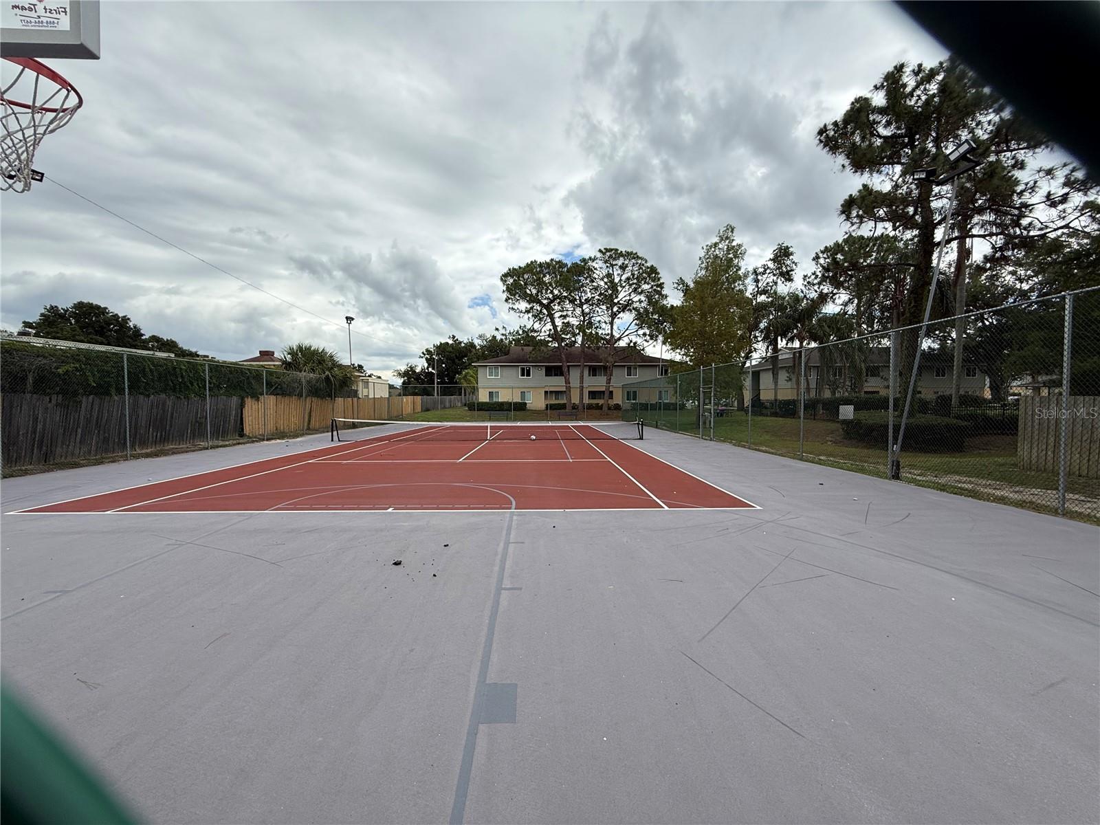 TENNIS/BASKETBALL COURT