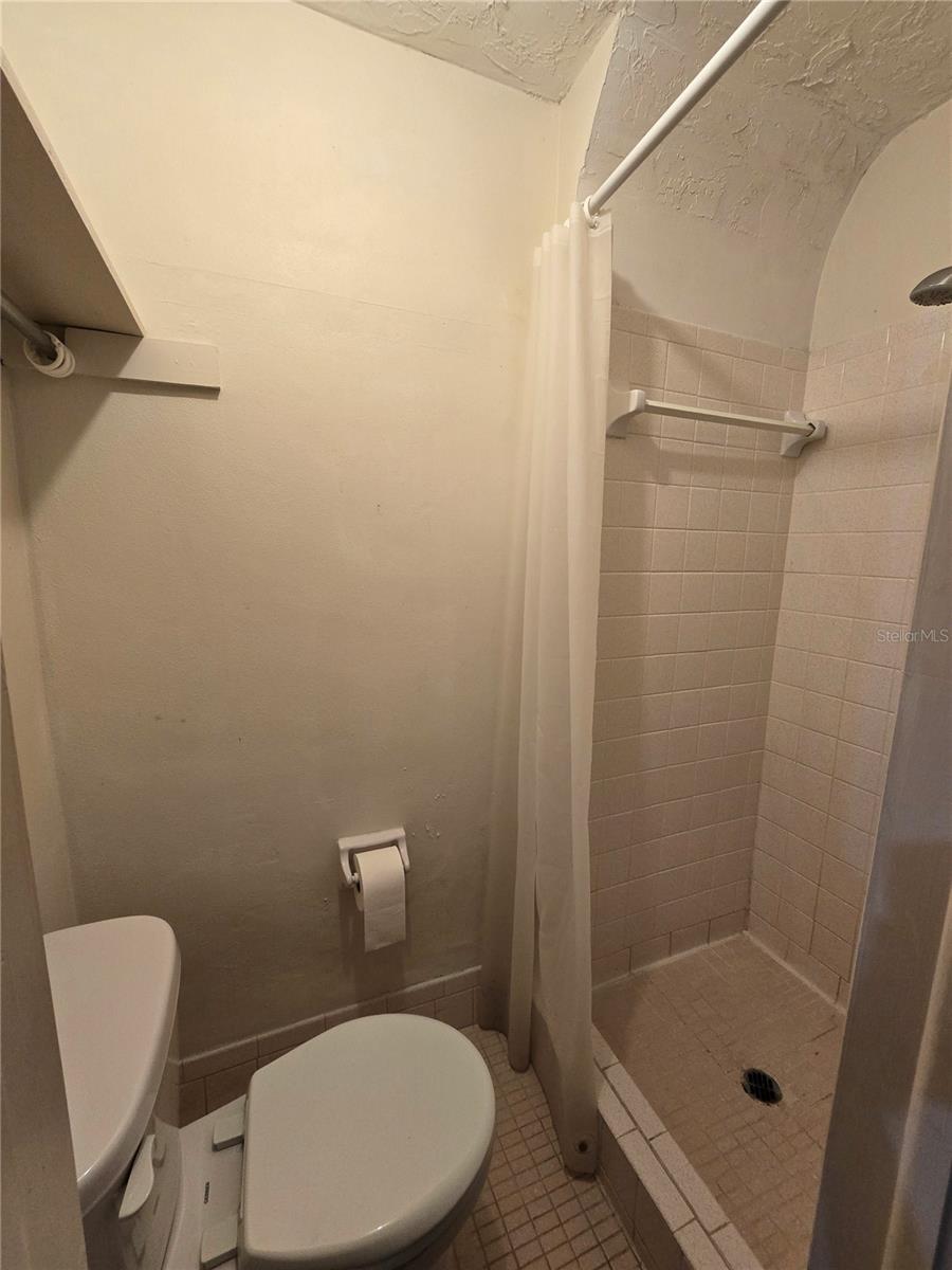 1/2 bath with shower instead of only a sink!