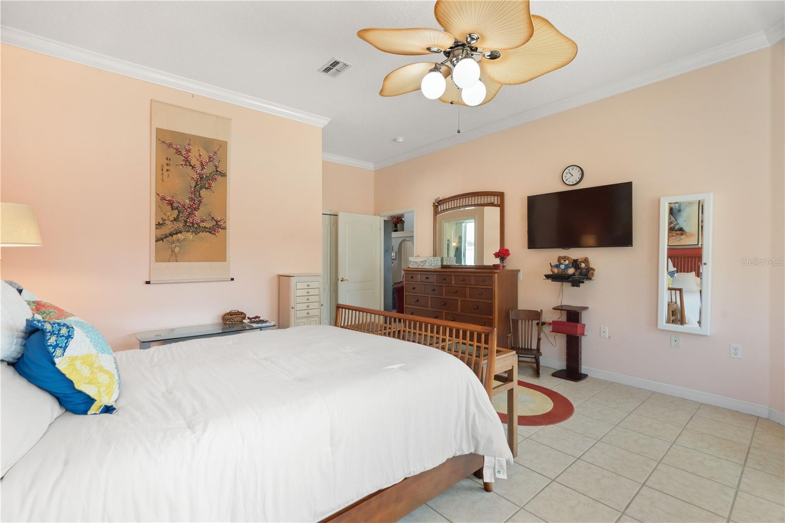 The primary bedroom with ensuite has a walk in closet to the left.