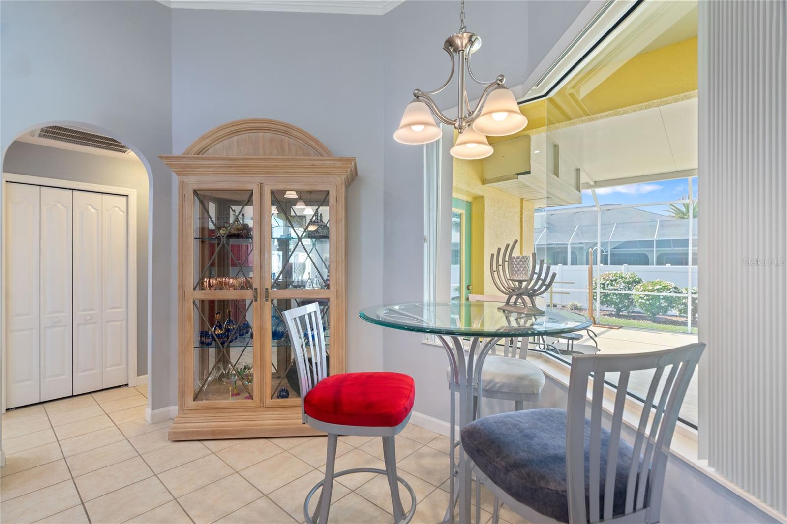 Breakfast nook near kitchen. Linen closet is behind the bifold doors in the hallway.