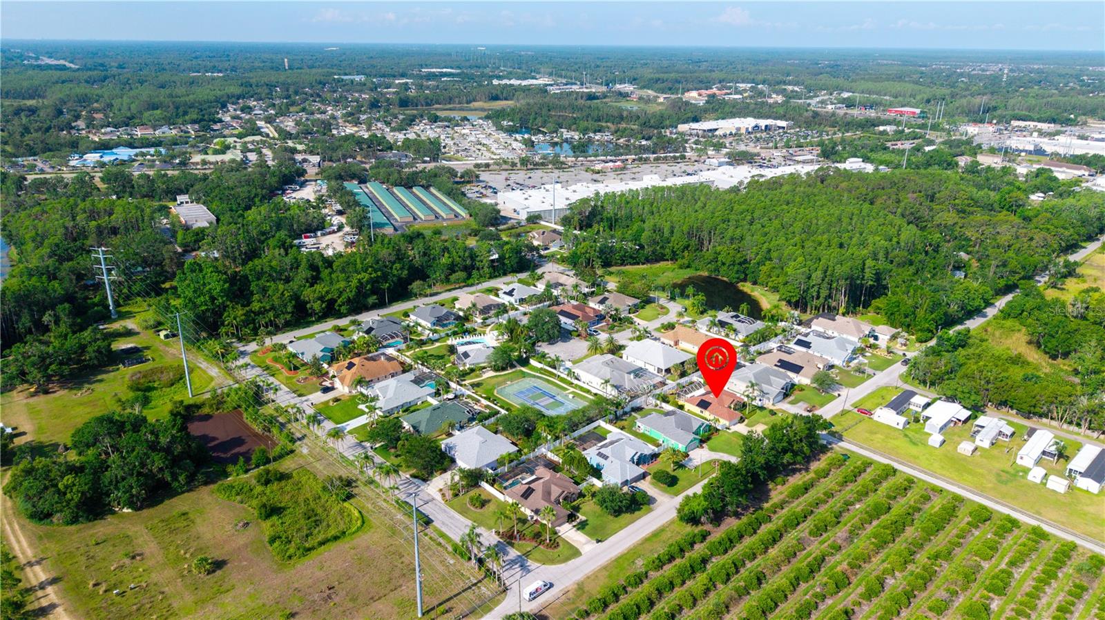 From this aerial view you can see the shopping center that has places to eat, shop, buy clothes, get dental care and your nails done