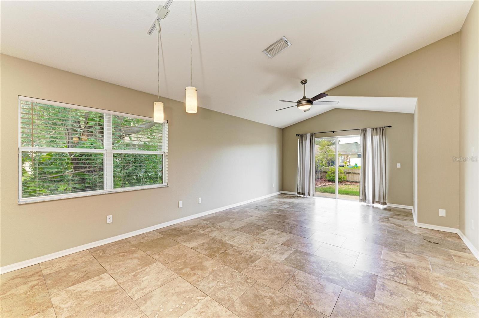 Travertine tile throughout the entire home