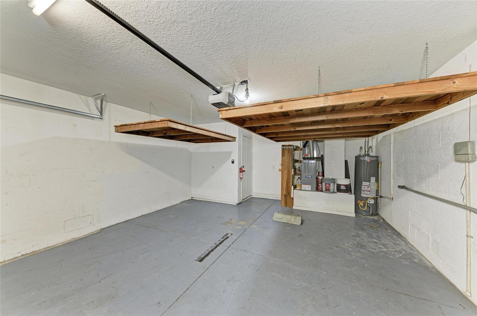 Garage with re-enforced hanging storage racks