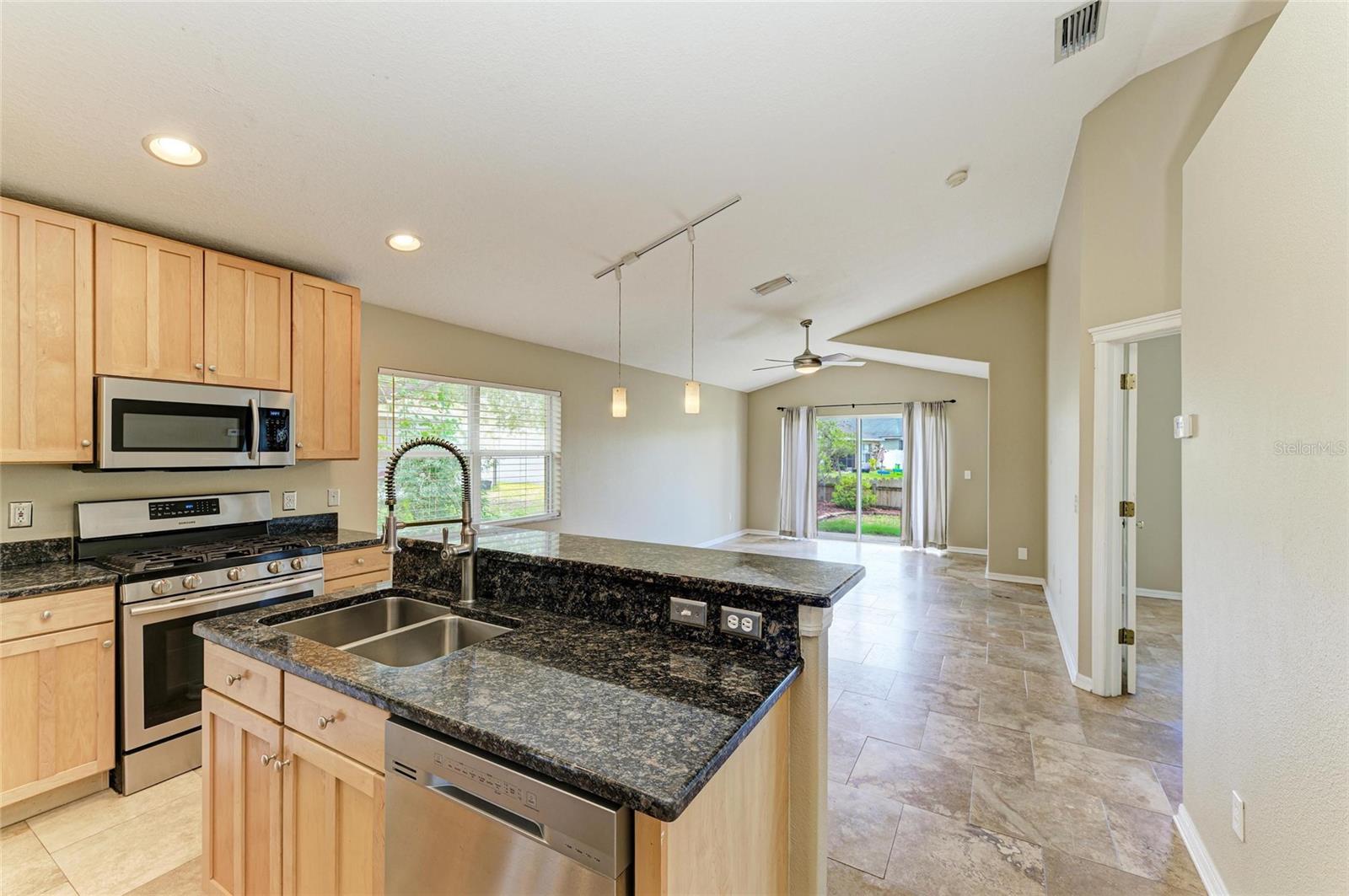 Stainless Appliances including gas stove, granite counter tops