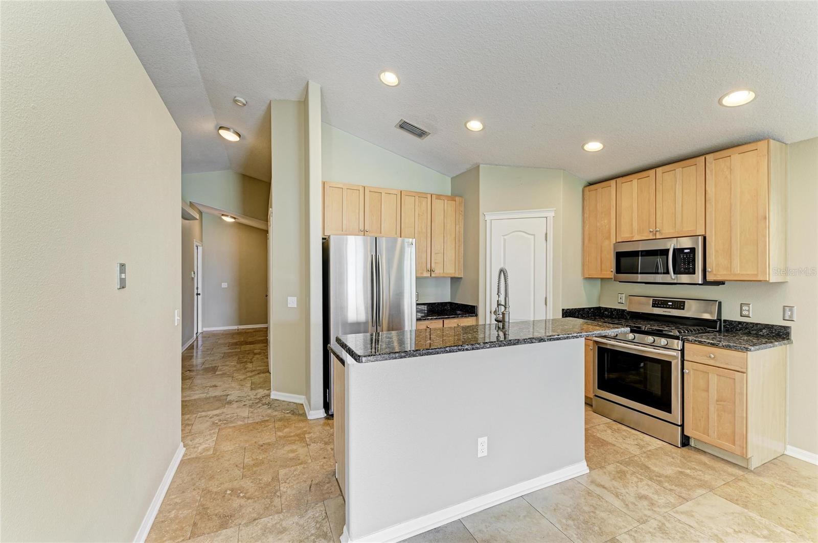 Kitchen open to dining area and living room
