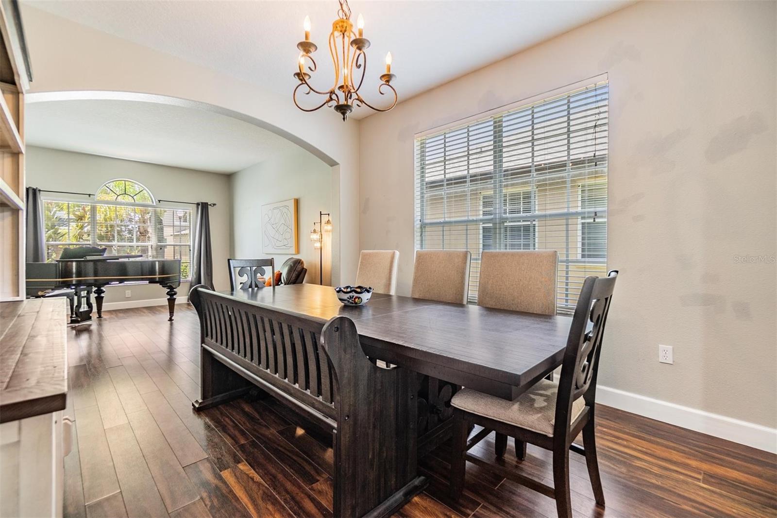 Separate dining room adjoins living room for effortless entertaining