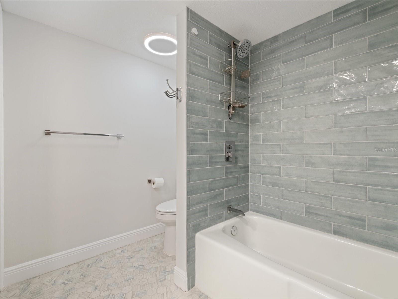 Updated primary bath with shower/tub combo