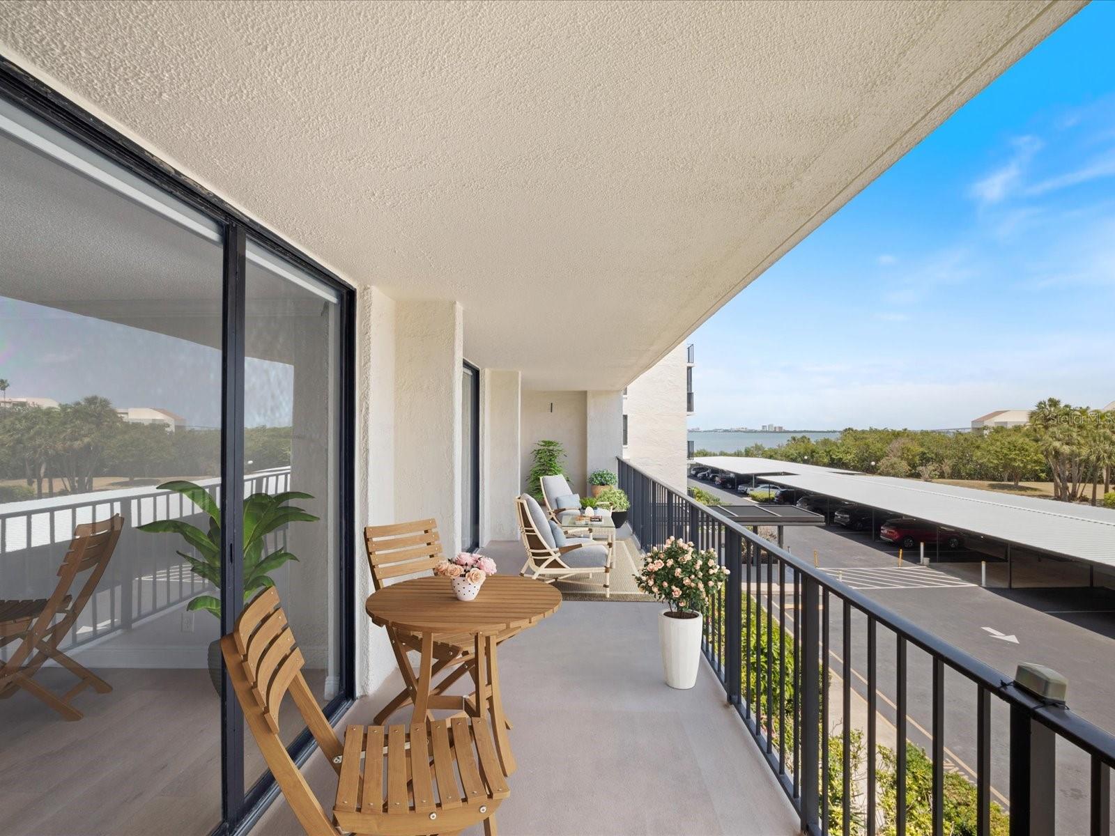 Expansive balcony with views of Intracoastal and pond