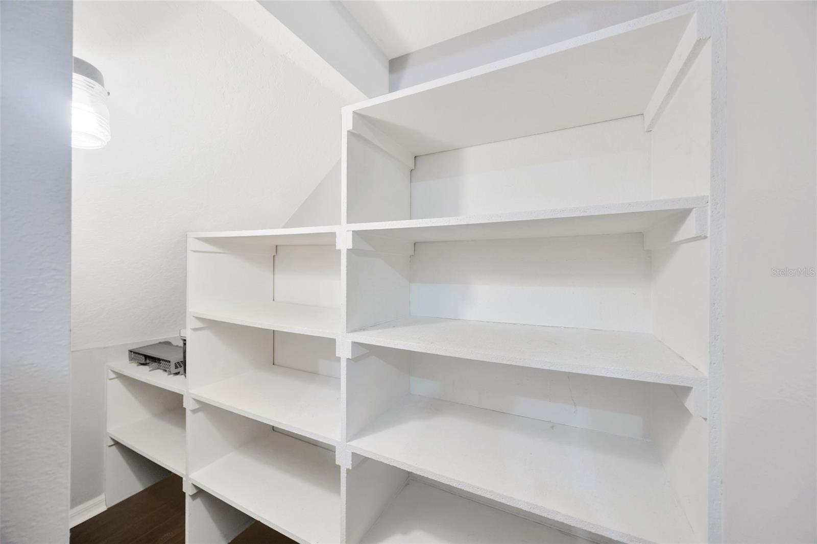 Under-stairs storage.