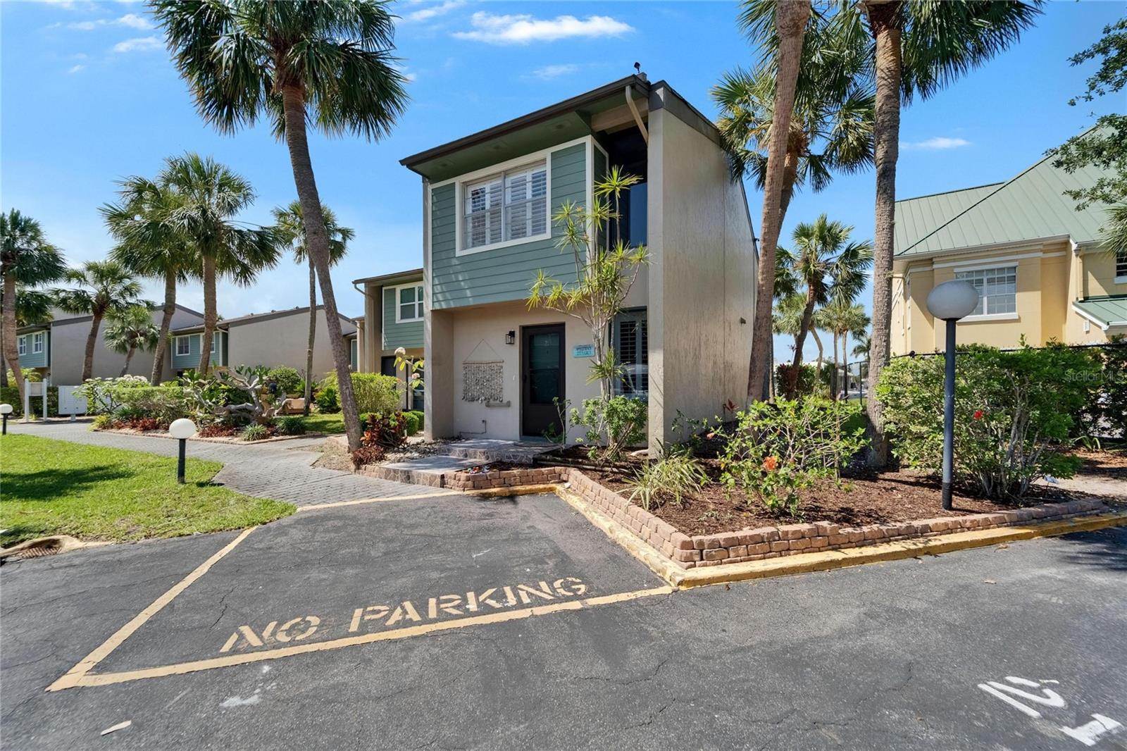Exterior Front View w/Designated Parking Spot