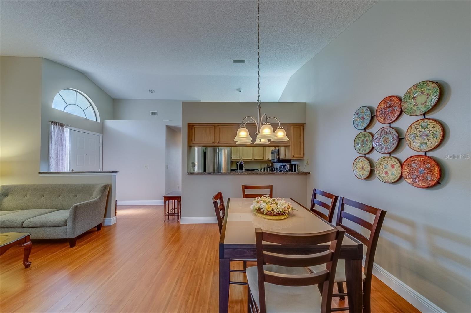 DINING AND LIVNG ROOM WITH HIGH CEILINGS