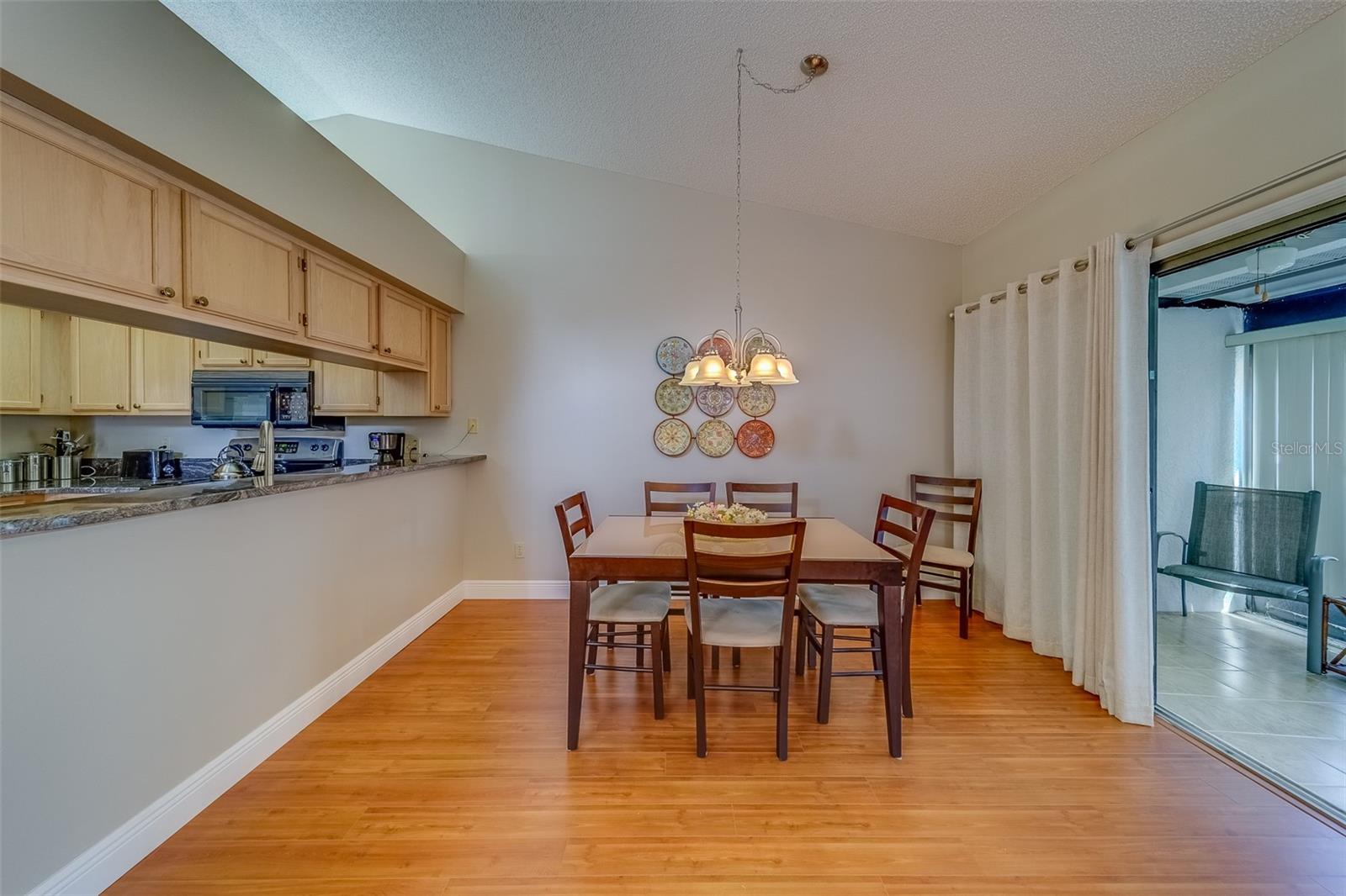 DINING AND LIVNG ROOM WITH HIGH CEILINGS