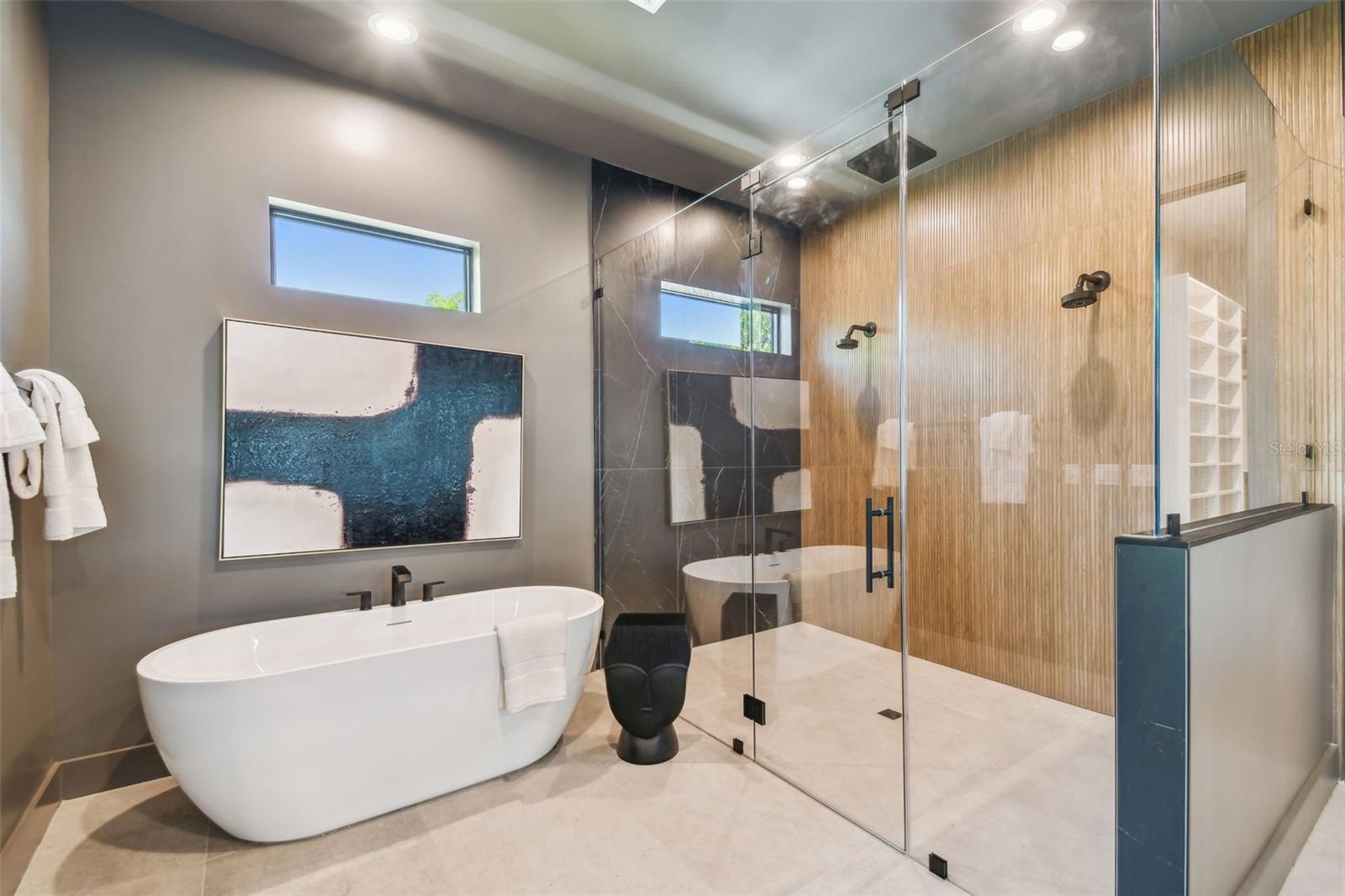 Free-standing tub with oversized shower