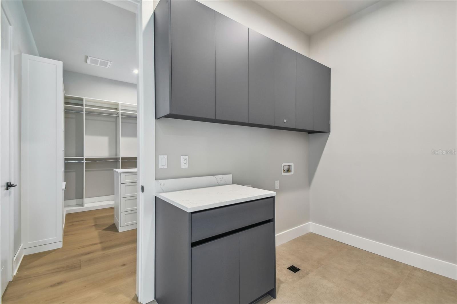 Laundry Room off Primary Walk In Closet