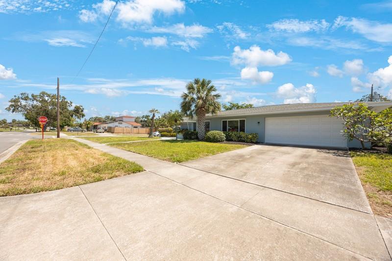 Front exterior with large driveway