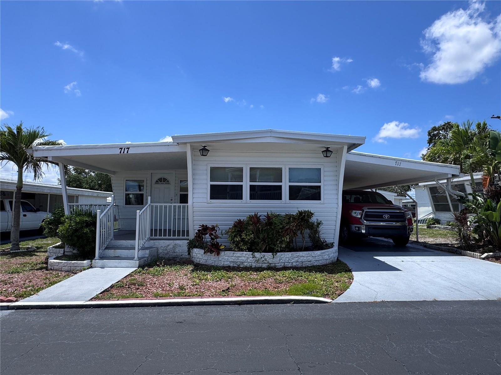Welcome Home! This home is a well maintained single wide with a Florida Room.