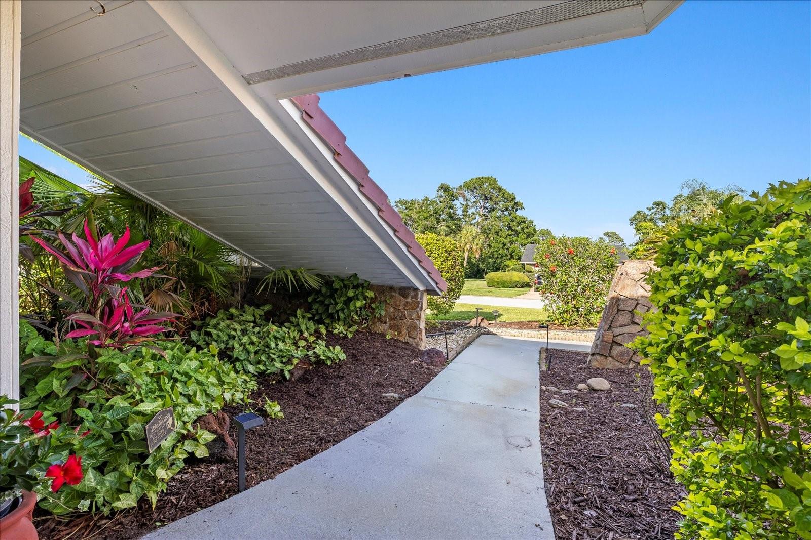 Stunning, gardens as you exit or enter your front door.