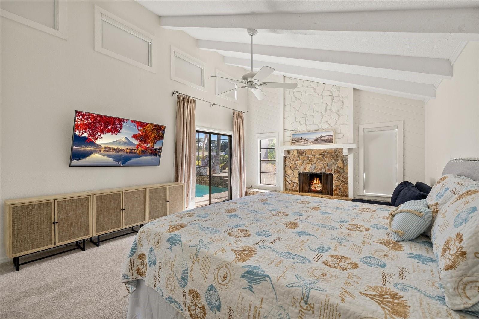 Vaulted tongue and grove "shiplap" . ceilings with beams. Fireplace was plumbing for gas.  Owners use as wood fired.