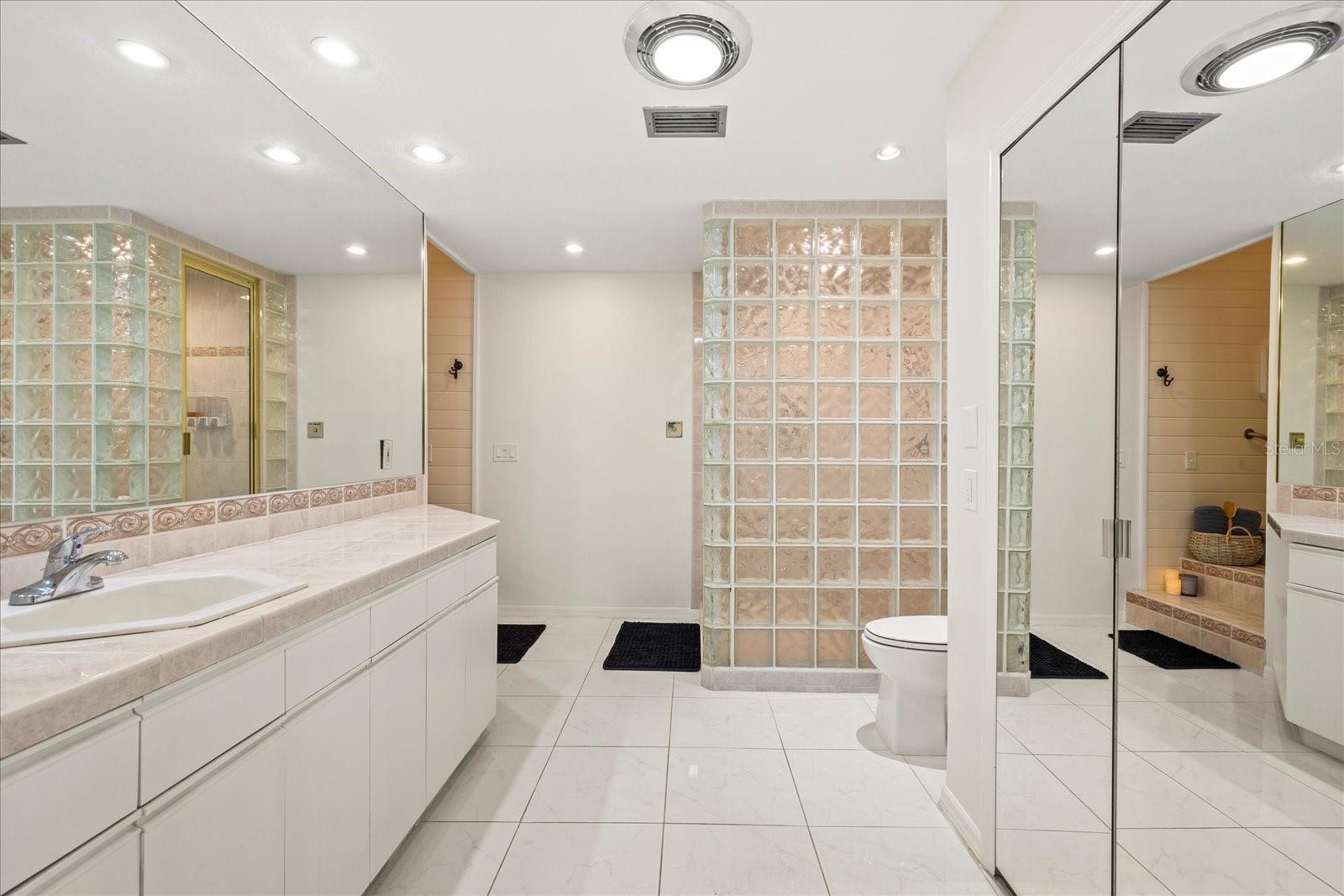 Large primary ensuite bathroom.