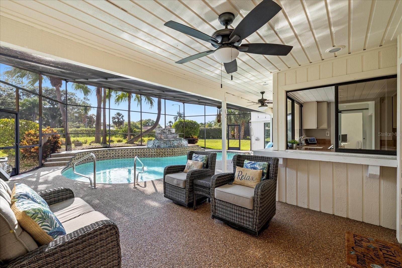 Covered lani seating.  With pocket sliders to the family/great room.  Fantastic flow for entertaining.