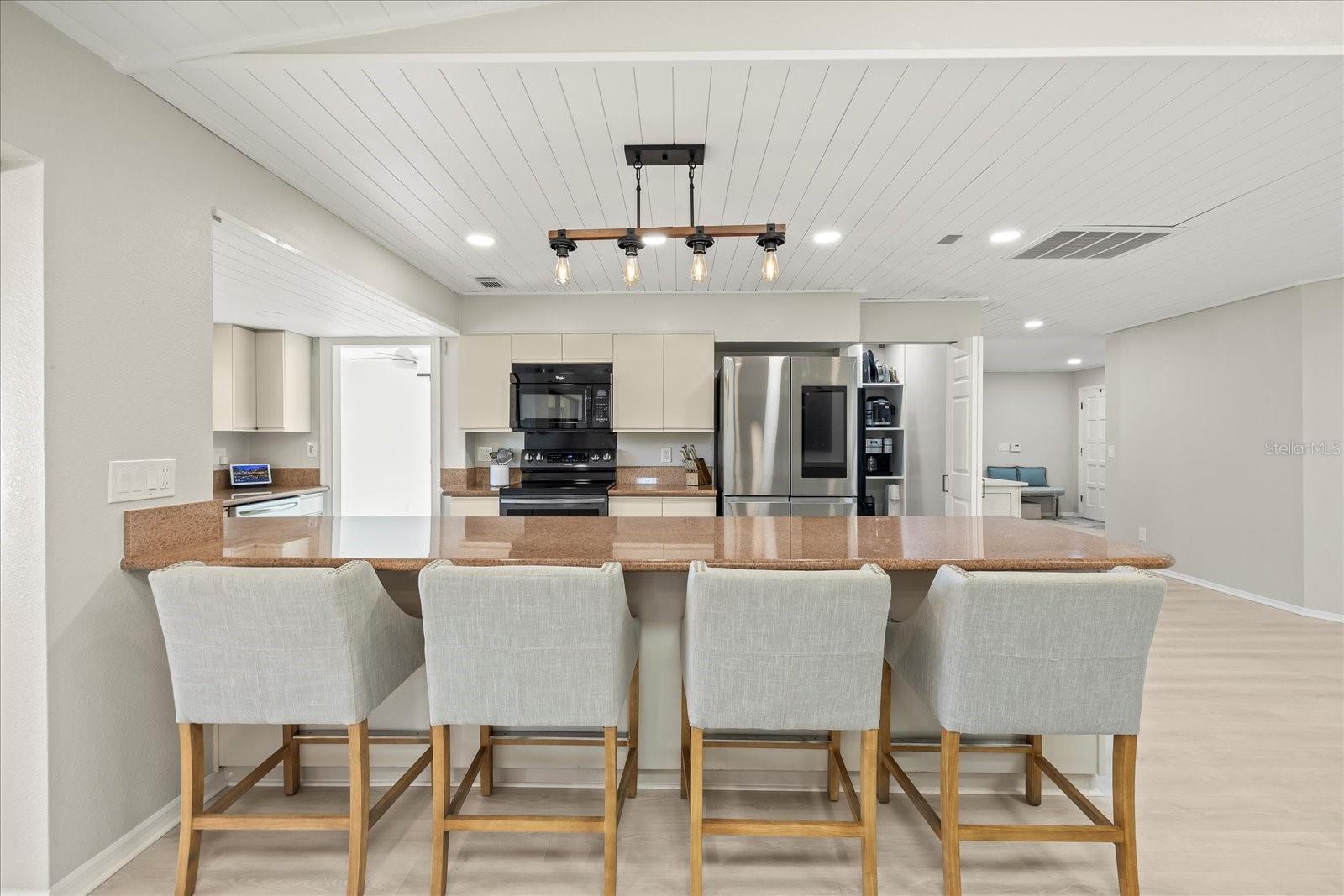 Chat with your family or guests while you cook. Large peninsula provides plenty of seating.