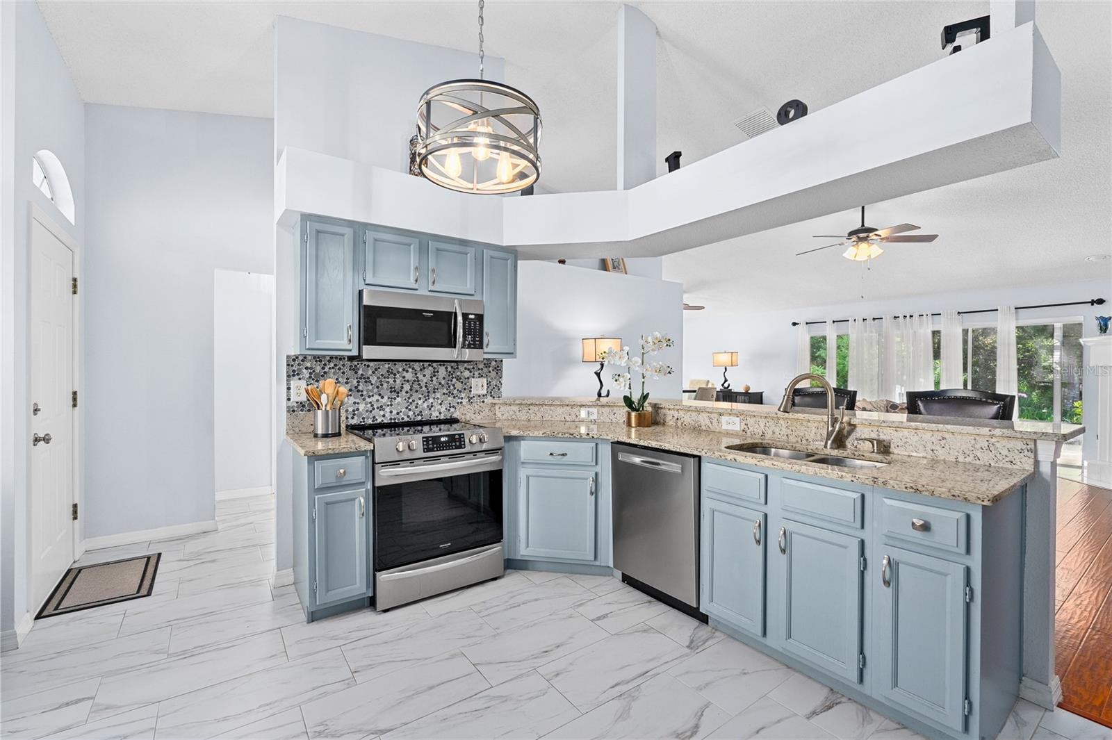 Newer stainless steel appliances make this Kitchen shine