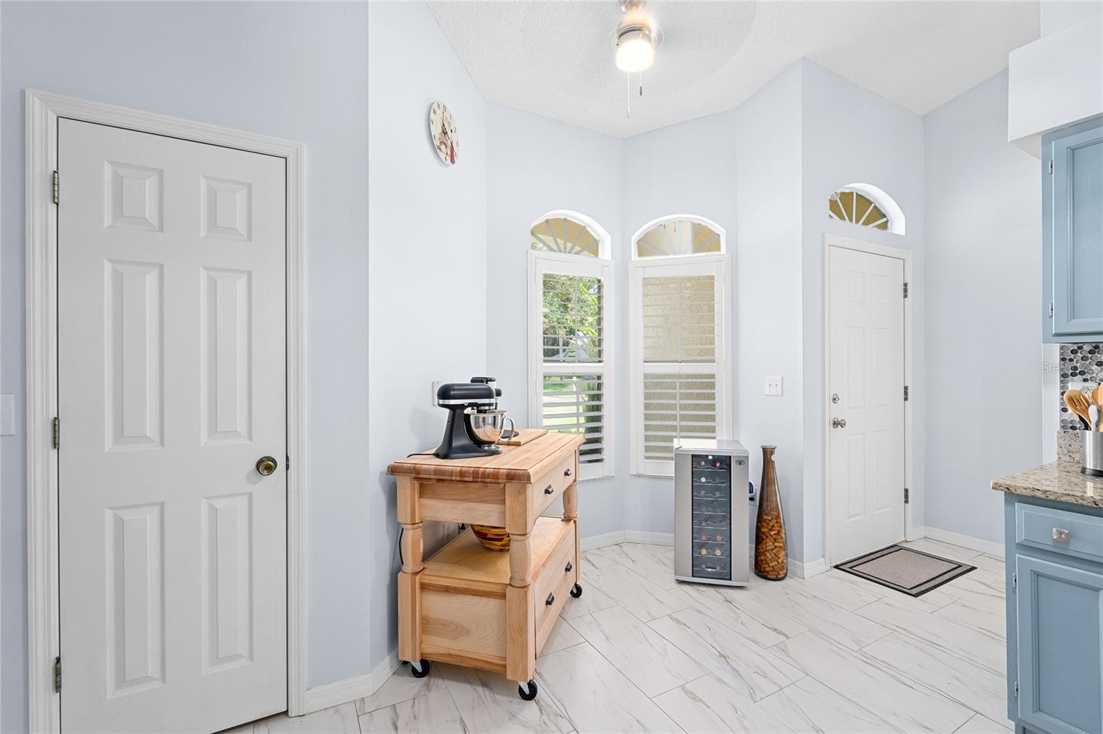Lots of Sunshine streaming through the Plantation Shutters of this home