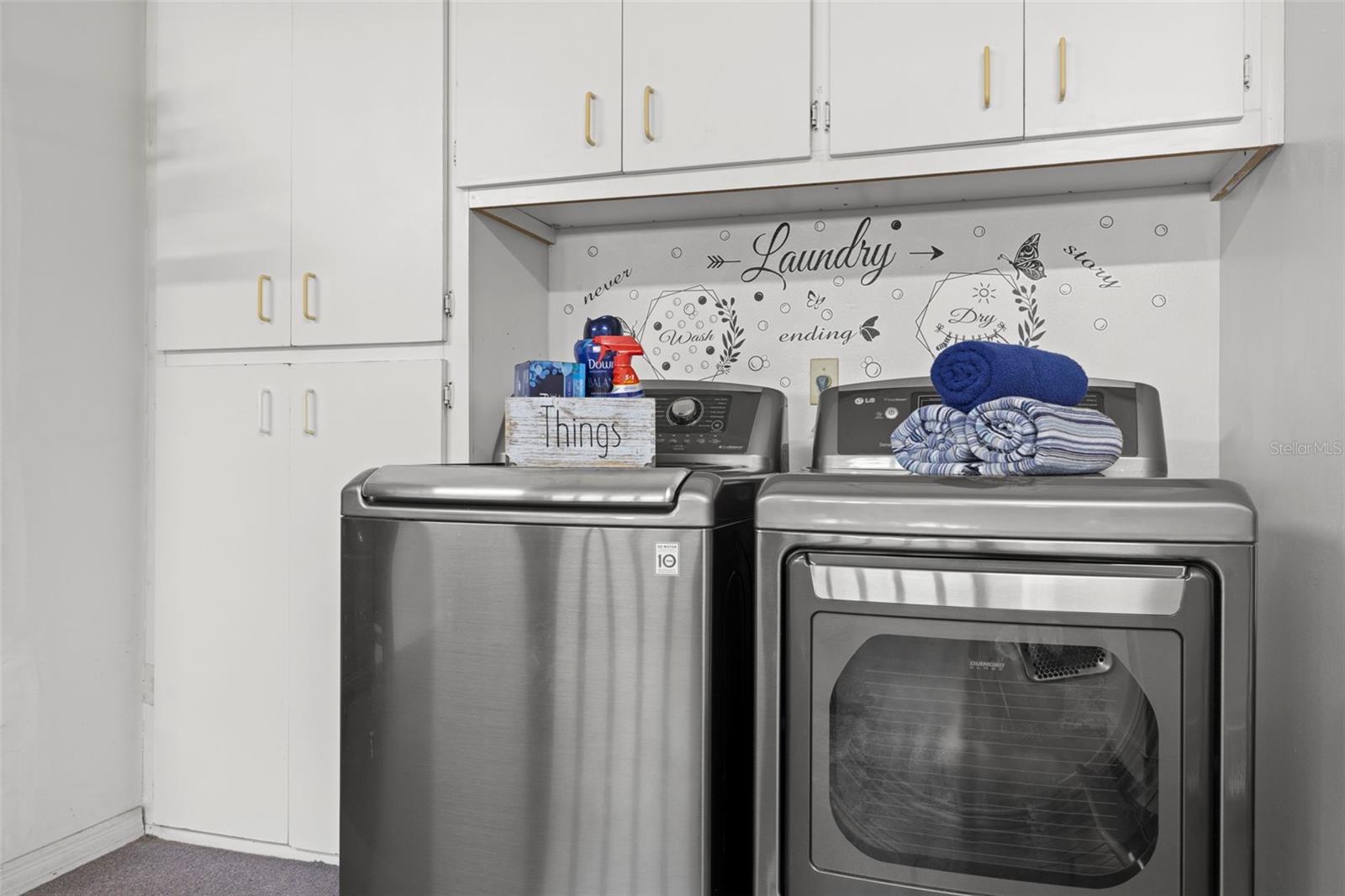 Laundry with newer W & D plus extra storage