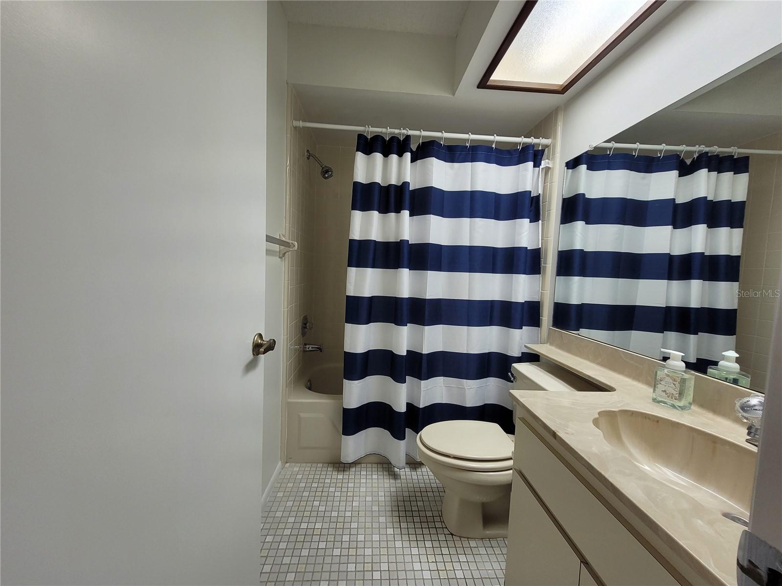 Second bathroom with tub/shower