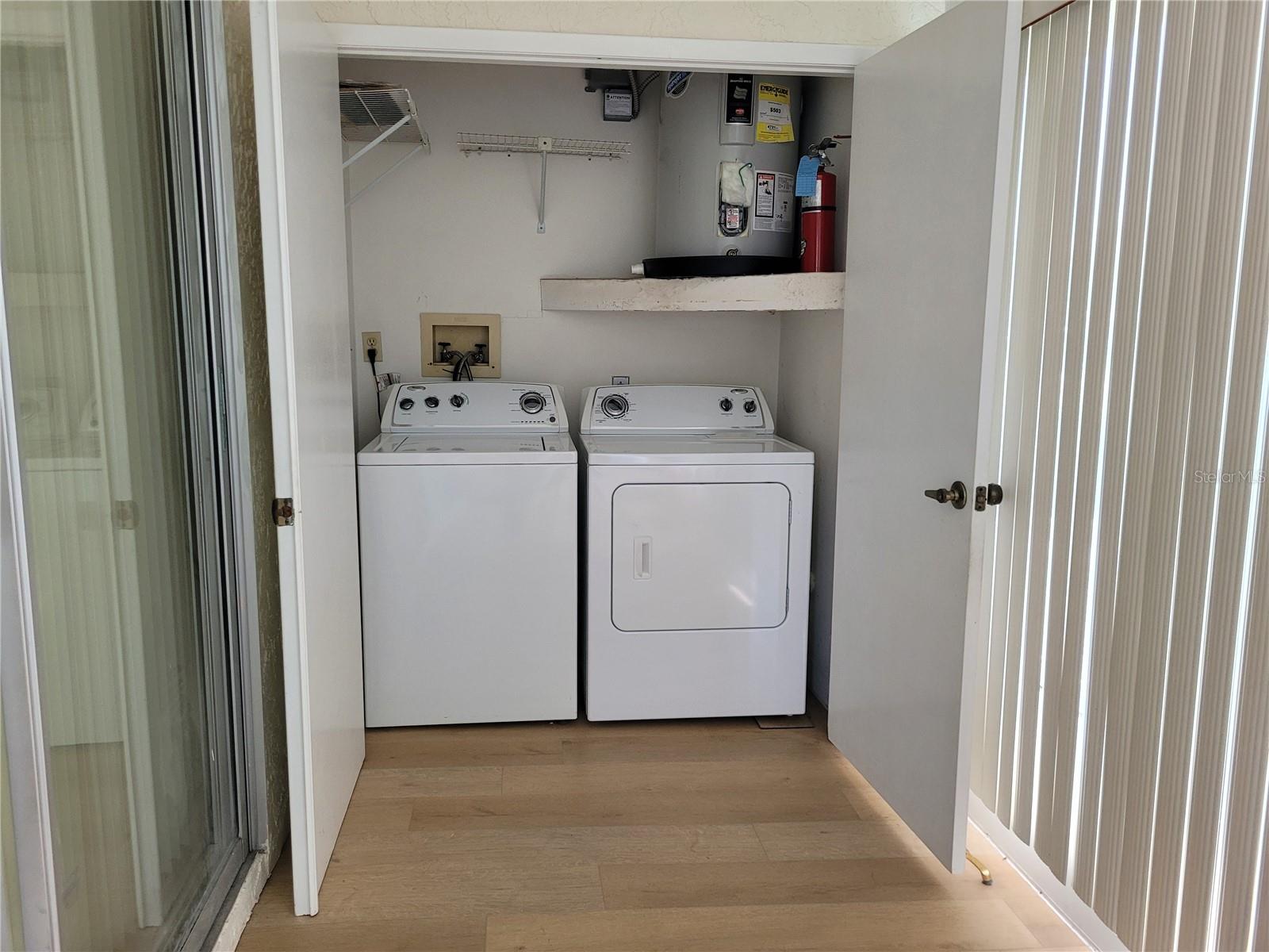 Indoor laundry room in Florida room