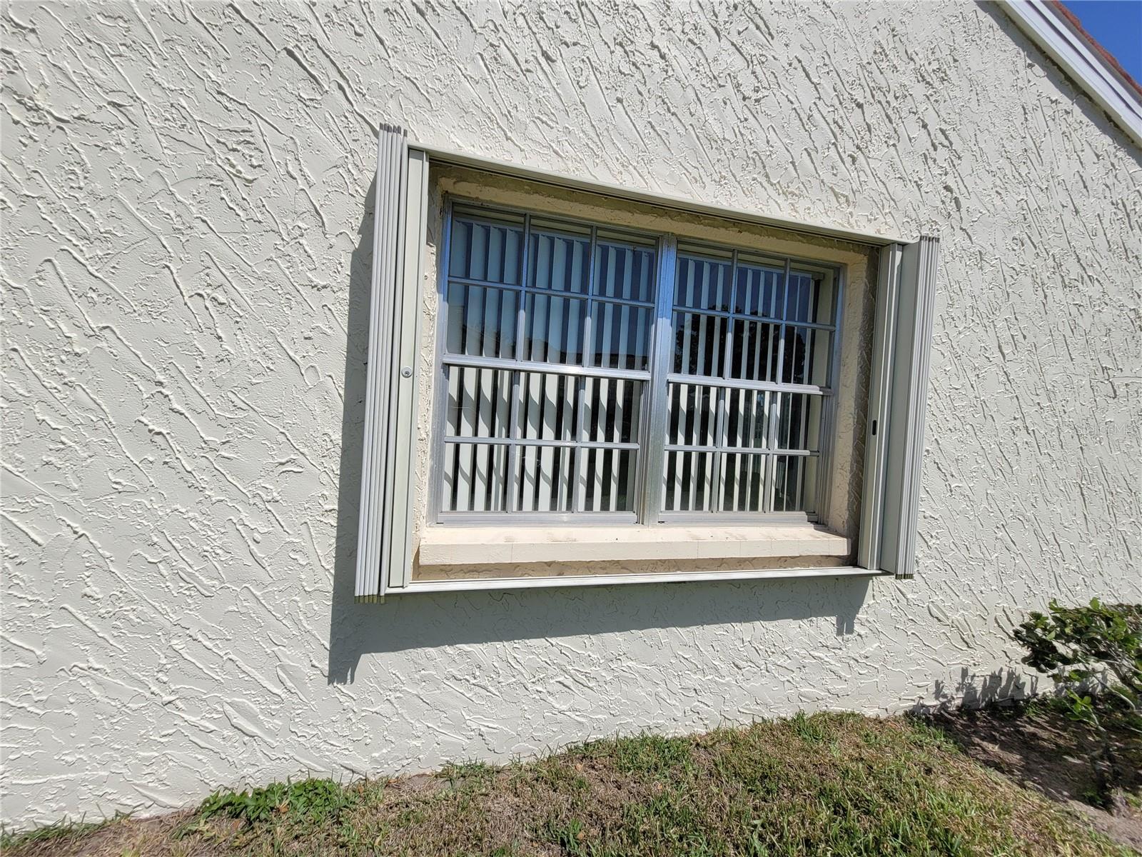 Side window with Hurricane shutter