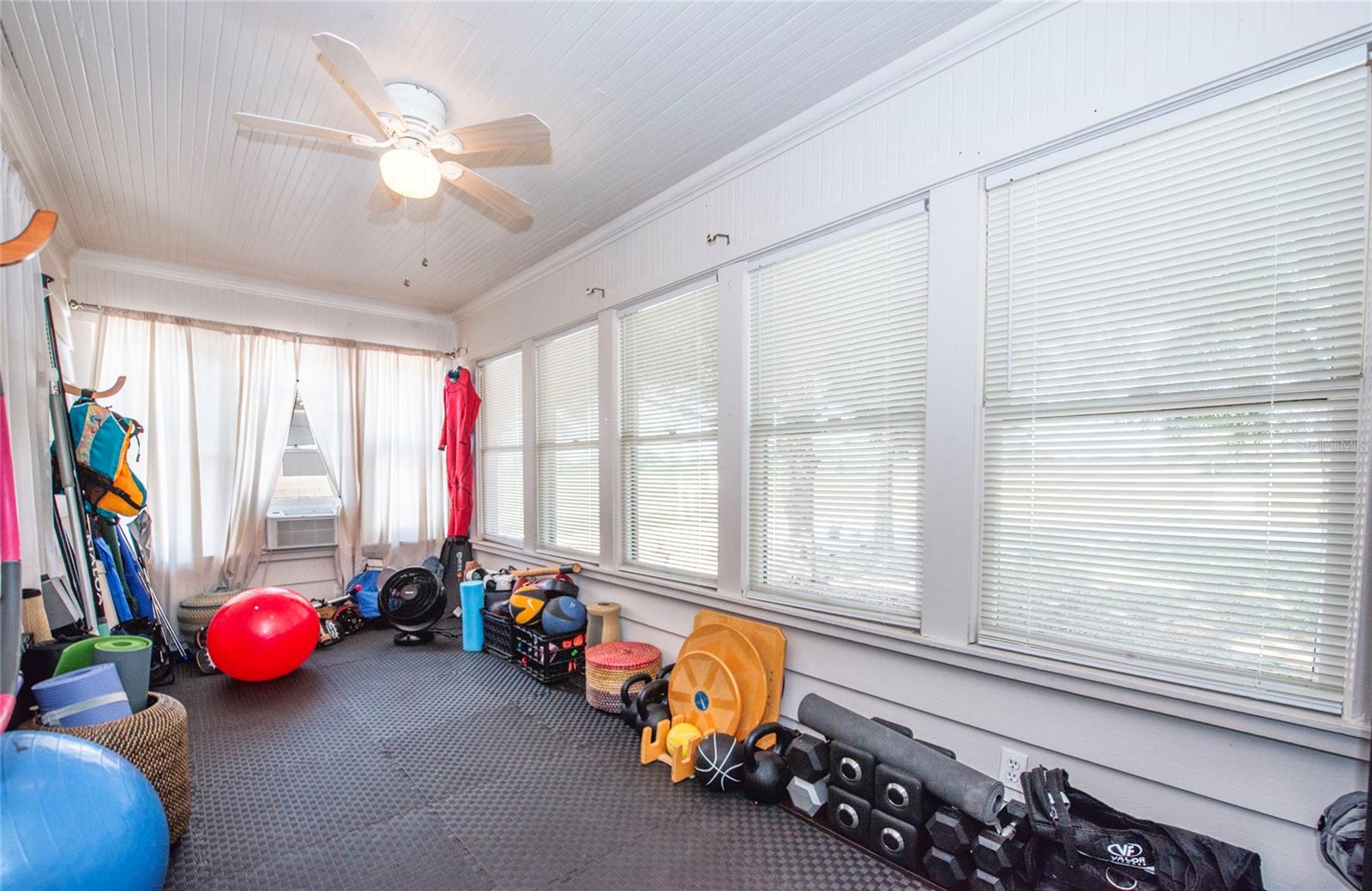 front enclosed porch with wall AC unit