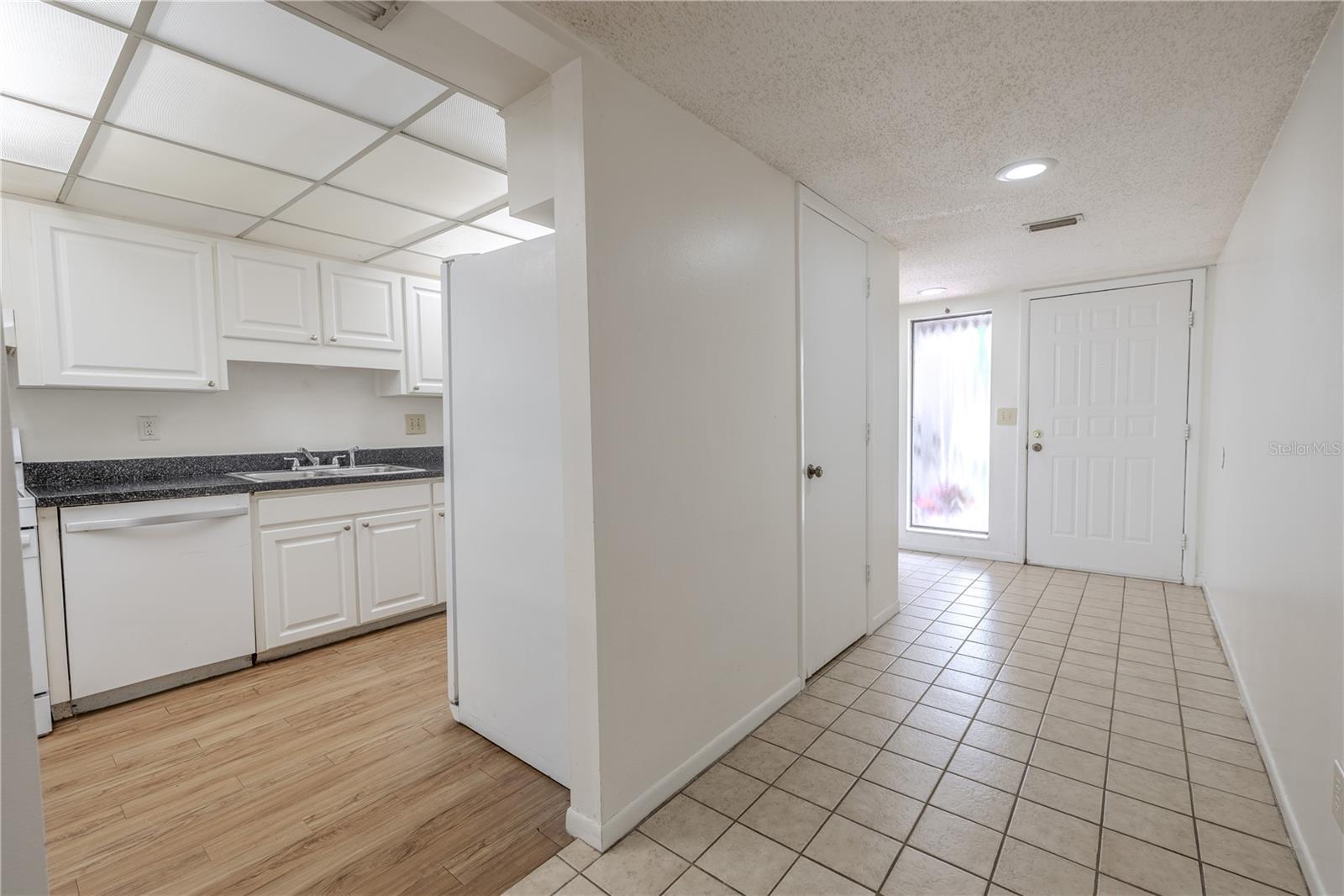 The foyer opens to the kitchen