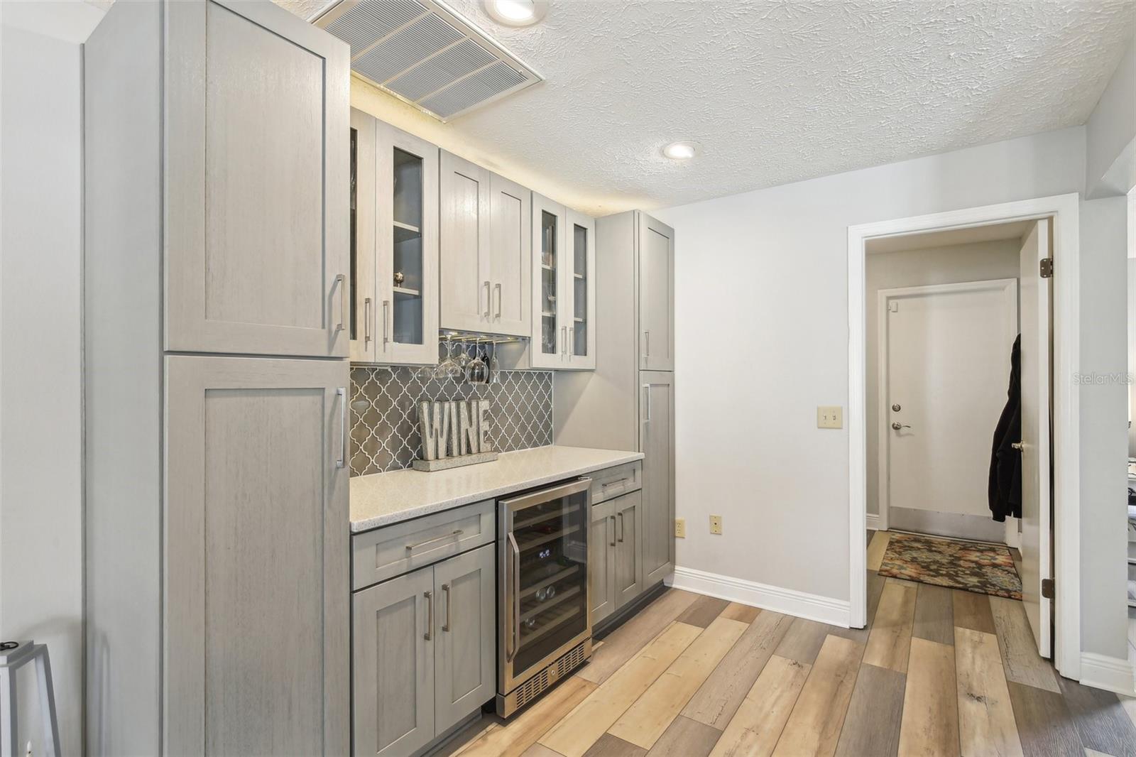 RECENTLY RENOVATED KITCHEN ADDS BEAUTY AND CHARM. ADDITIOANL CABINETS ADDS TO YOUR STORAGE!