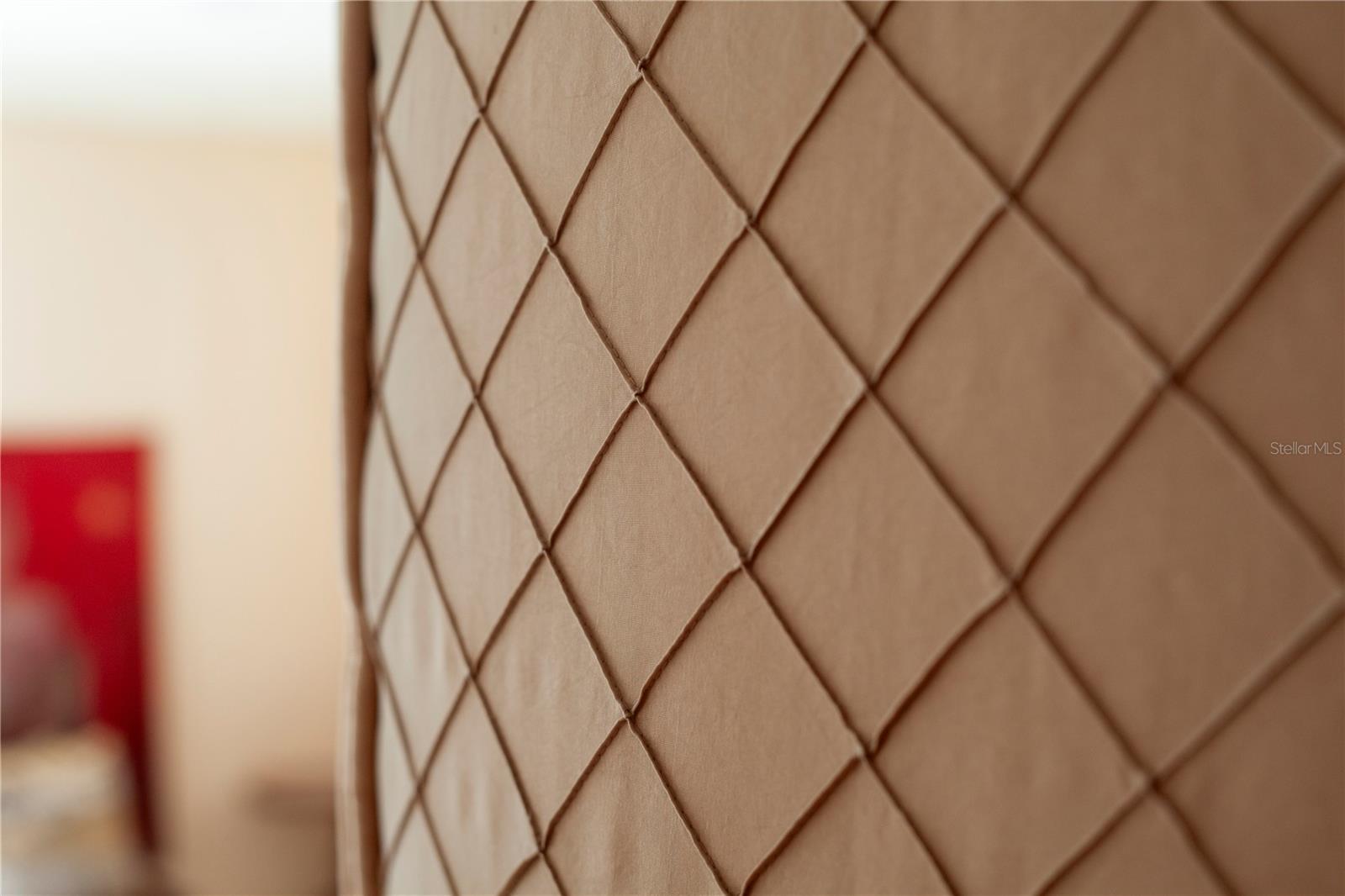 The upstairs suite has french upholstered walls