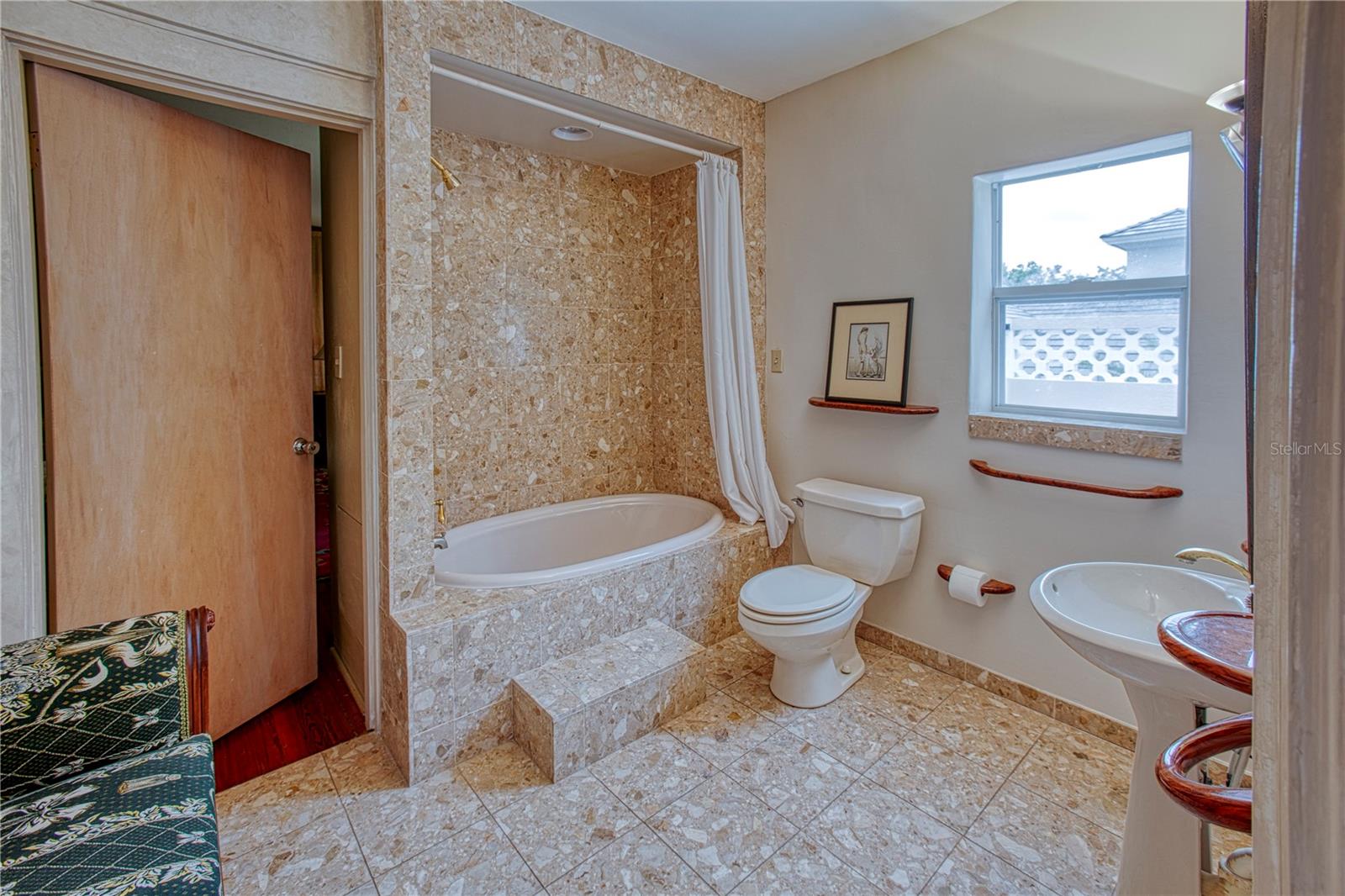The Jack and Jill bath that serves the second and third upstairs bedrooms
