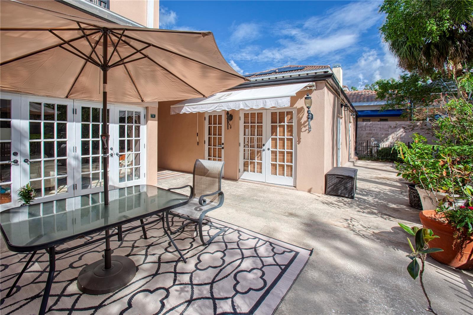Outdoor entertaining area and a view of the 2 bedroom 1 bath detached in-law suite