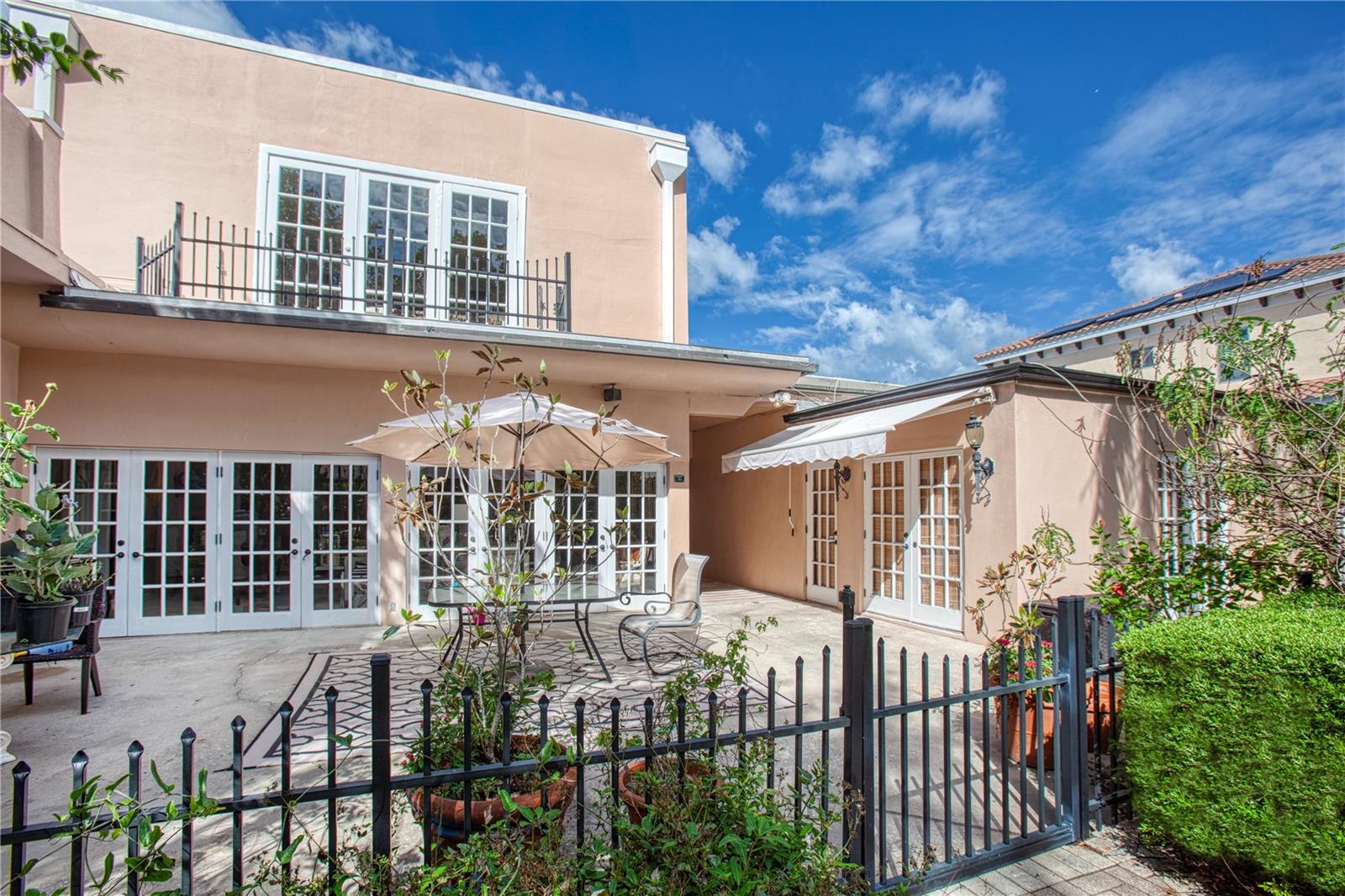 A view of the french doors that open to the back yard oasis