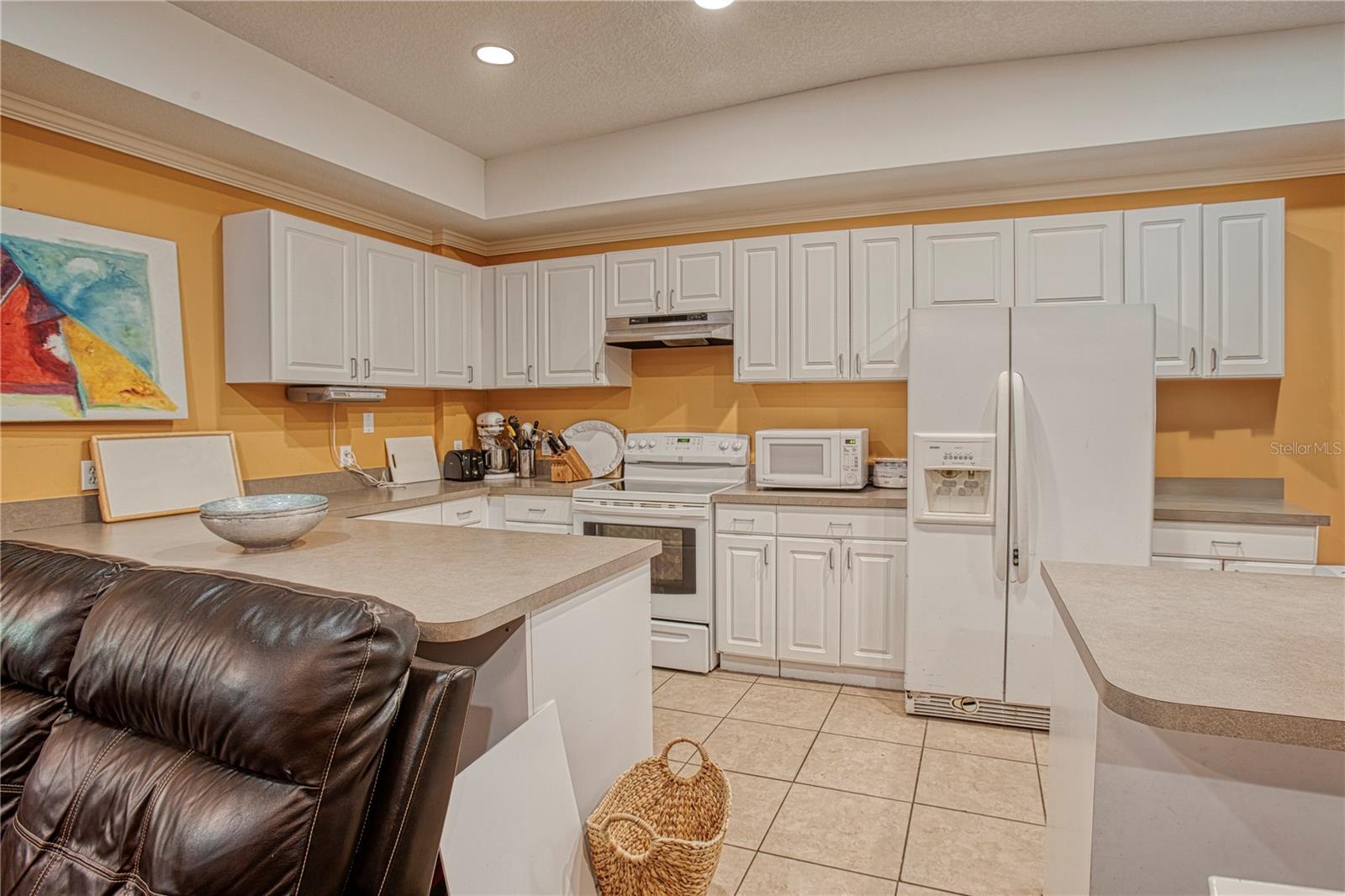 The detached 2 bedroom 1 bath in-law suite has a full kitchen