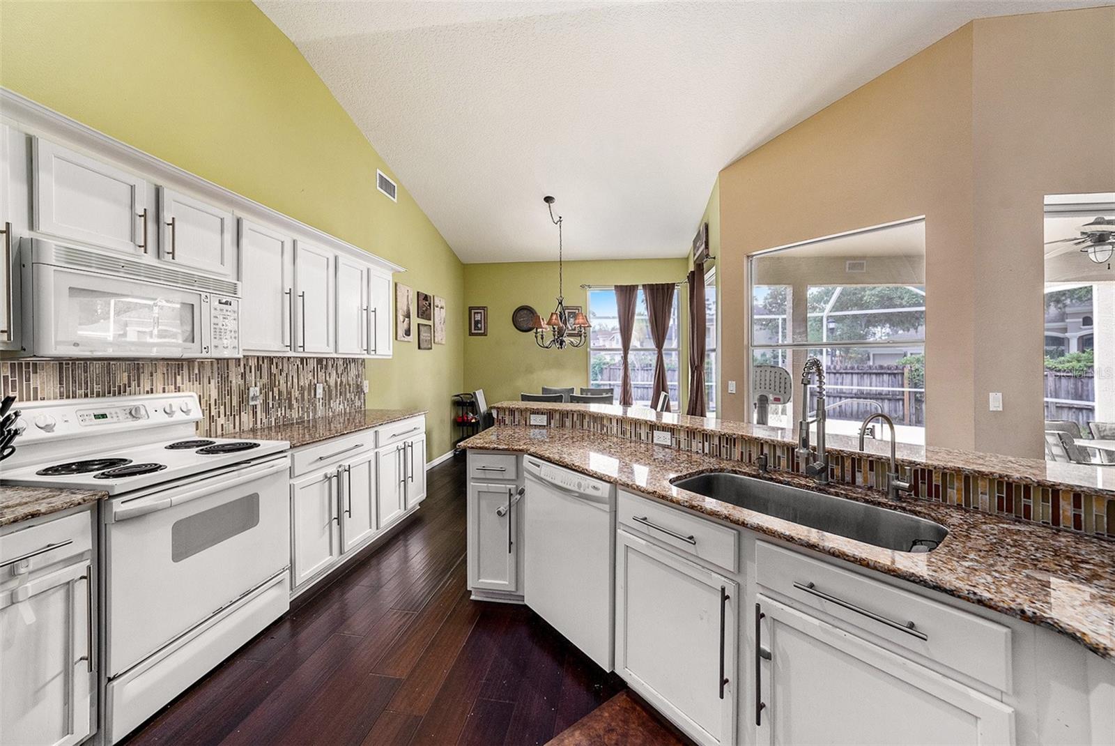Spacious kitchen with granite countertops