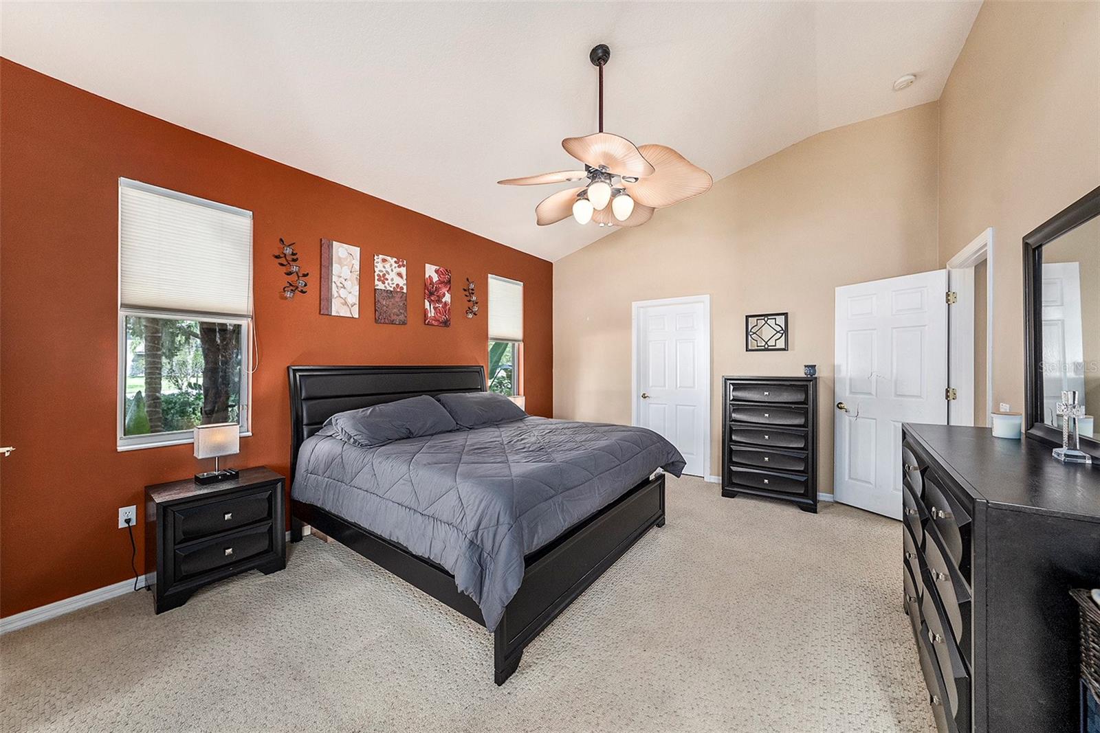 LARGE primary bedroom features a huge walk-in closet and ensuite bathroom